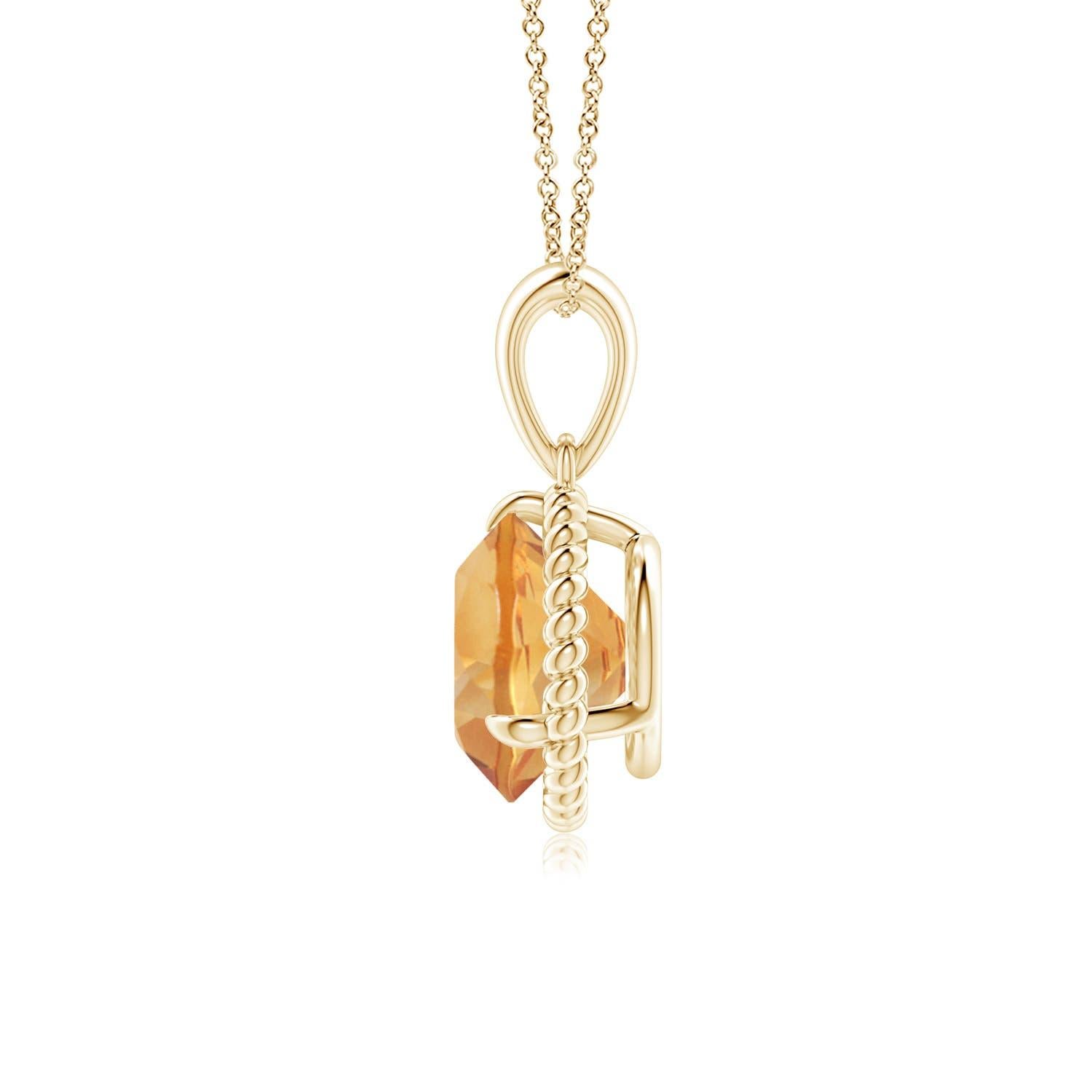 D'une élégance féminine, ce pendentif solitaire en citrine est conçu en or jaune 14k. La citrine ronde sertie de griffes est entourée d'un cadre en corde torsadée qui confère une touche de distinction au design. Disponible en différents poids de