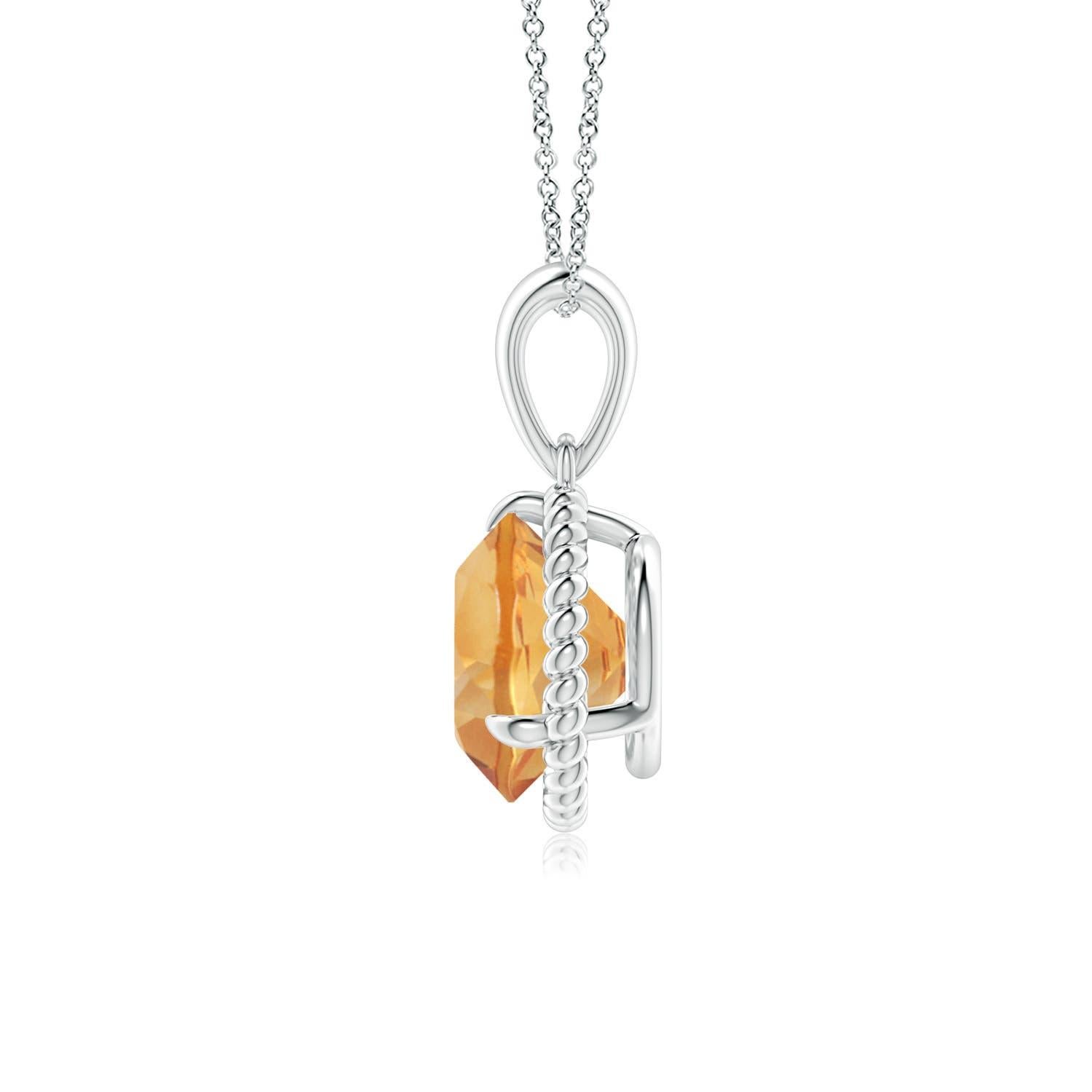 Exhalant une élégance féminine, ce pendentif solitaire en citrine est conçu en or blanc 18 carats. La citrine ronde sertie de griffes est entourée d'un cadre en corde torsadée qui confère une touche de distinction au design. Disponible en différents