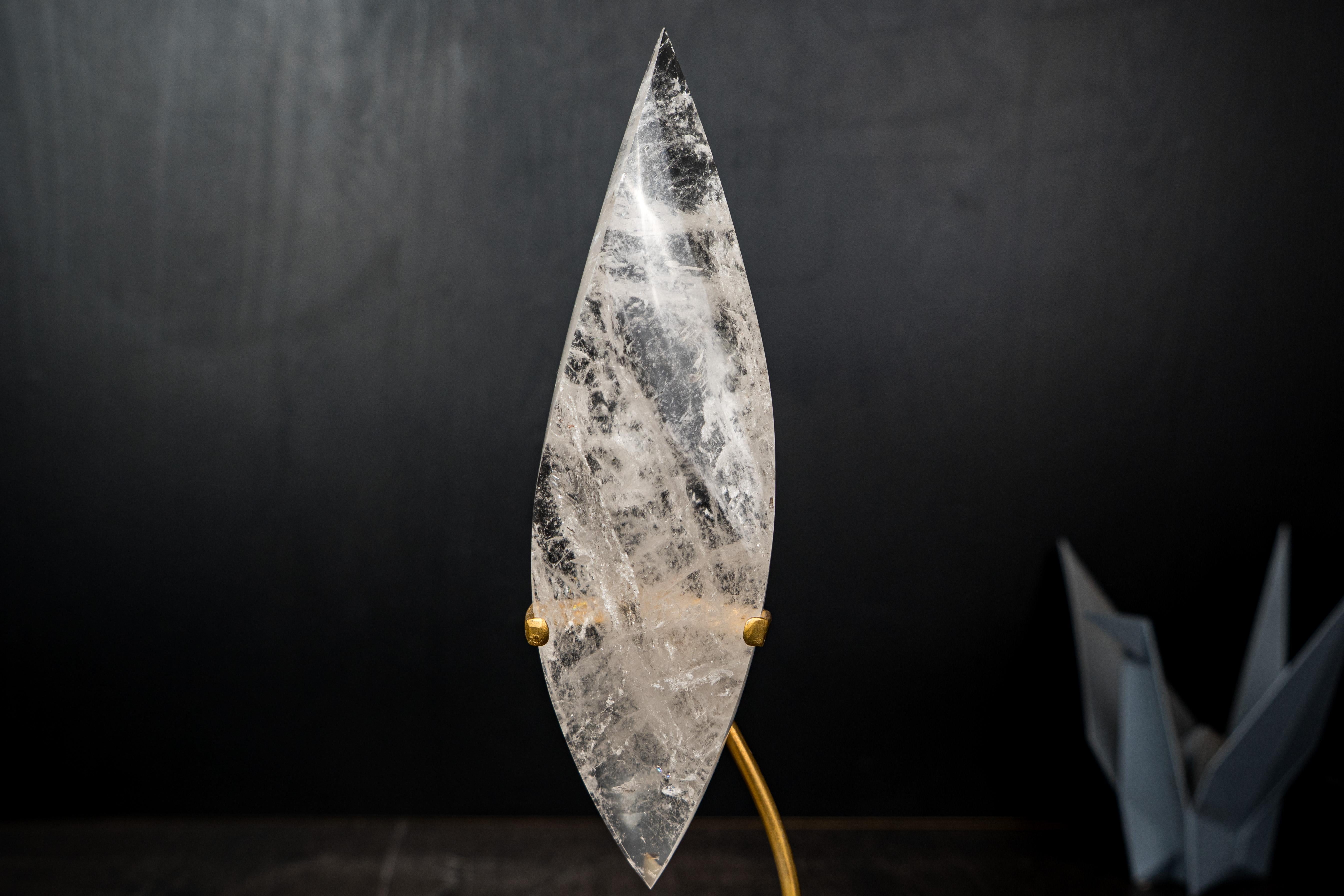 A Hand-Carved Clear Quartz Flame Radiating Energy

Bringing exceptional clarity and superb lapidary work, this crystal quartz was carefully cut into a flame shape by an artisan in Curvelo, MG. An aesthetical piece that showcases all of my favorite