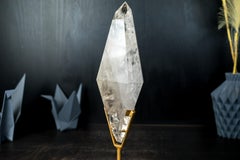 Natural Clear Quartz Obelisk Sculpture with Multi-Faceted Sides on Metal Stand