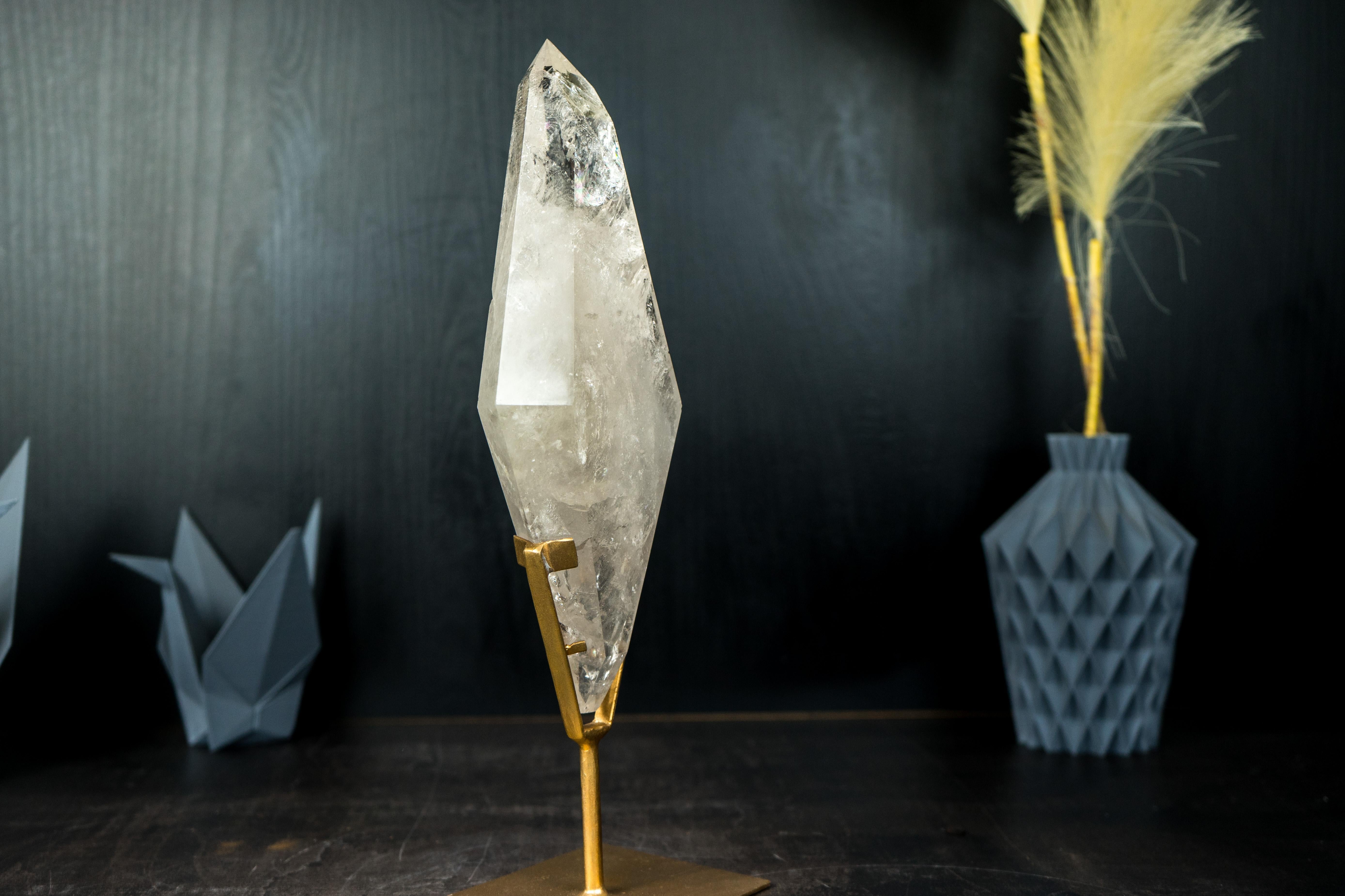 Contemporary Natural Clear Quartz Obelisk Sculpture with Multi-Faceted Sides on Metal Stand For Sale