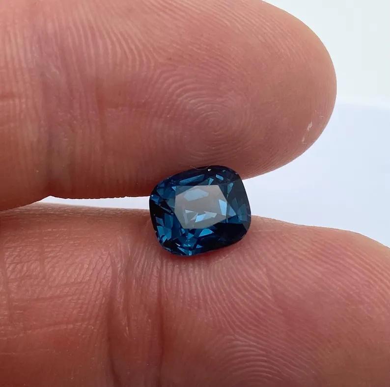 Natural Spinel gemstone

Laboratory certified
Gemstone Color: Blue
Gemstone Type: Spinel
Gemstone size: 9.05x7.81x5,84mm
Cut Grade: Very Good
Clarity/Grade: VS
Gemstone Shape: Cushion Cut
Gemstone Creation: Natural
Gemstone Treatment: Not Enhanced,