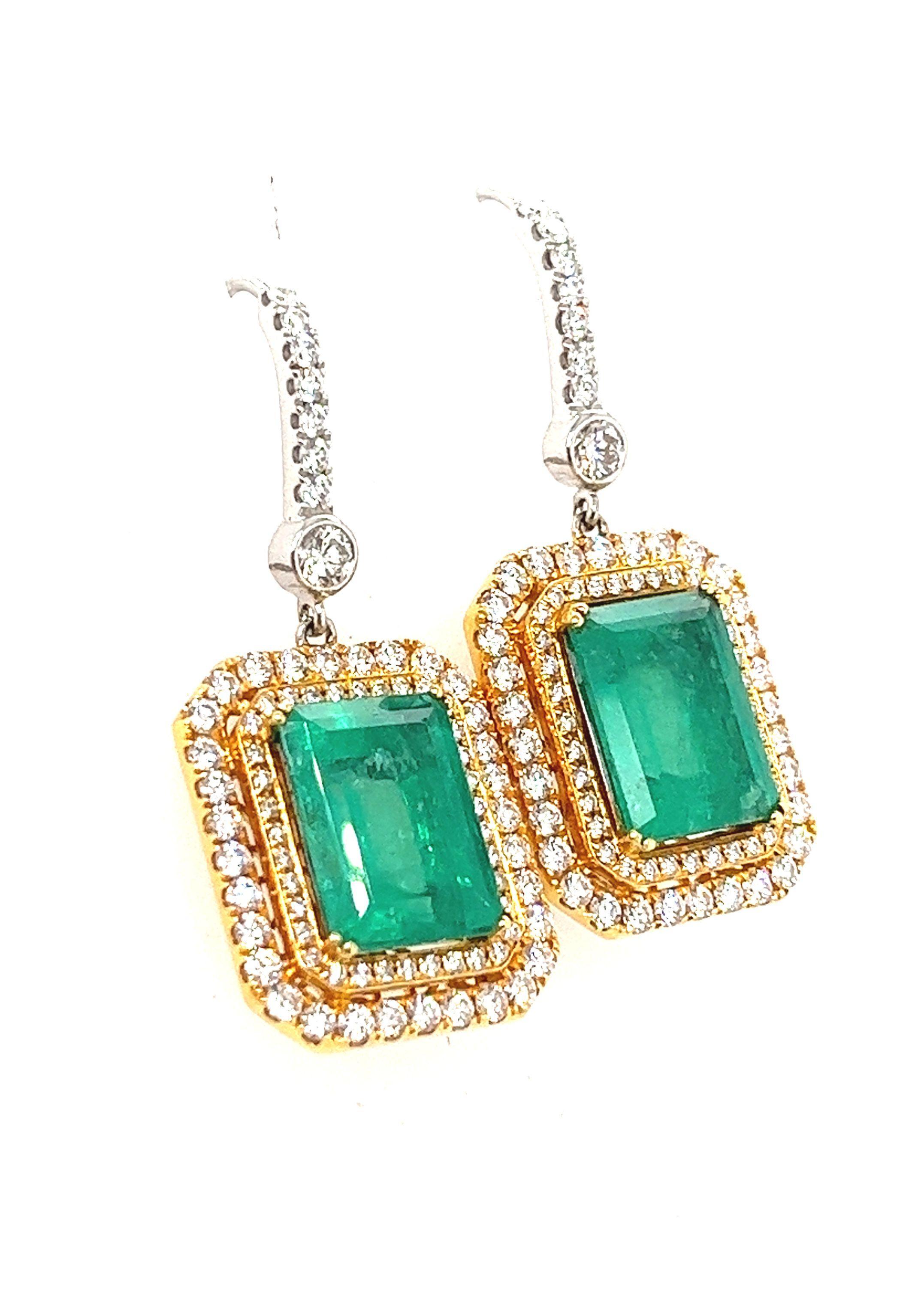 7.36 Carat Total Natural Colombian Emerald and Diamond Dangle Drop Earrings. 

Item Details:
- Type: Dangle Drop Earring 
- Metal: 18K White, Yellow Gold 
- Weight: 10.3 grams 
- Setting: Prong, Bezel  
- Drop Length: 1.4 inches