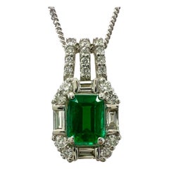 Natural Colombian Emerald 
Diamond Octagon Cut Platinum Halo Art Deco Pendant