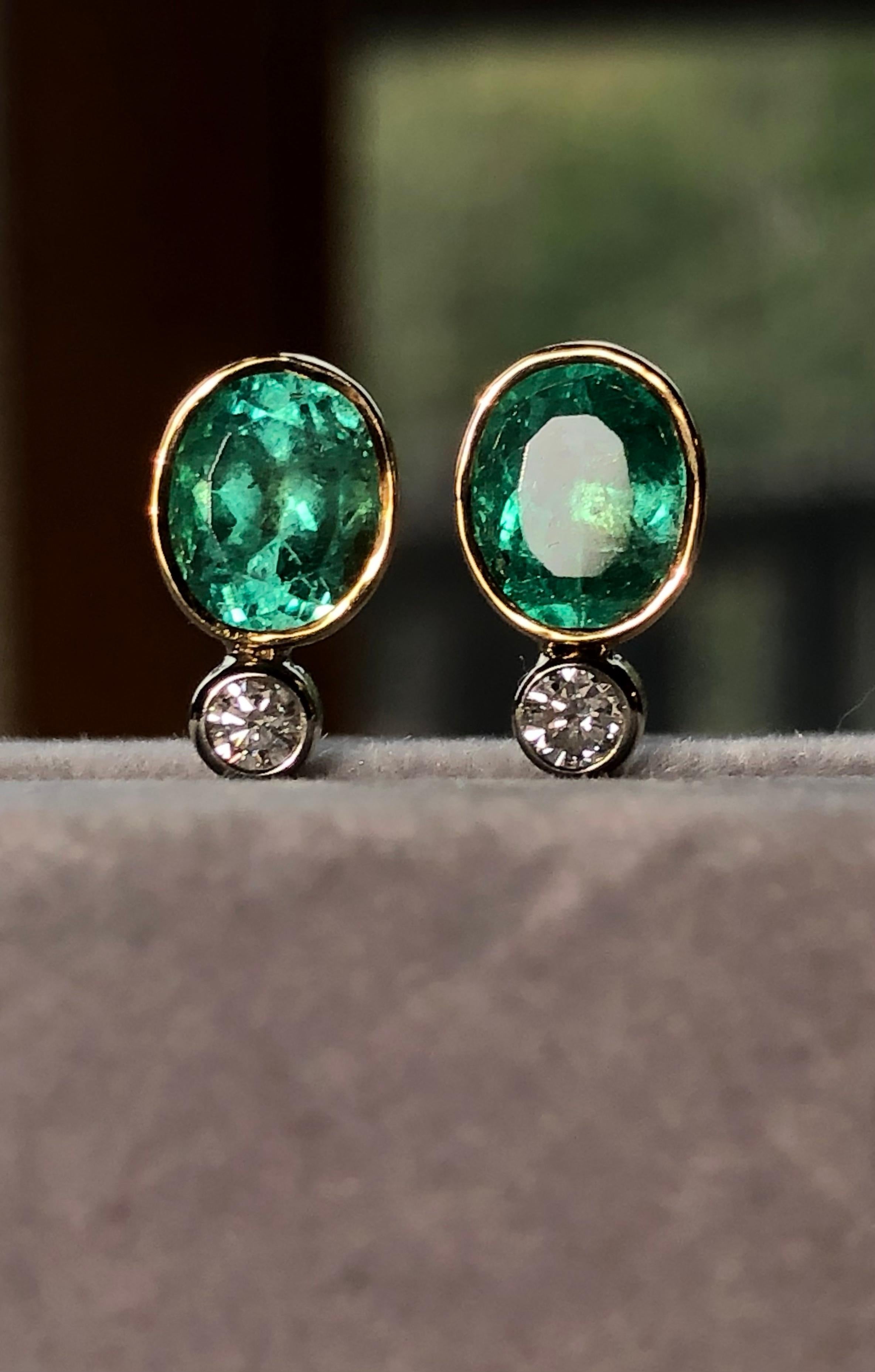 2.54 Carat Natural Colombian Emerald Diamond Stud Earrings 18k 
Primary Stones: 100% Natural Colombian Emeralds
Shape or Cut : Oval Cut
Average Color/Clarity : Beautiful Medium Green/ Clarity, VS
Total Weight Emeralds: Approx. 2.30 Carats (2