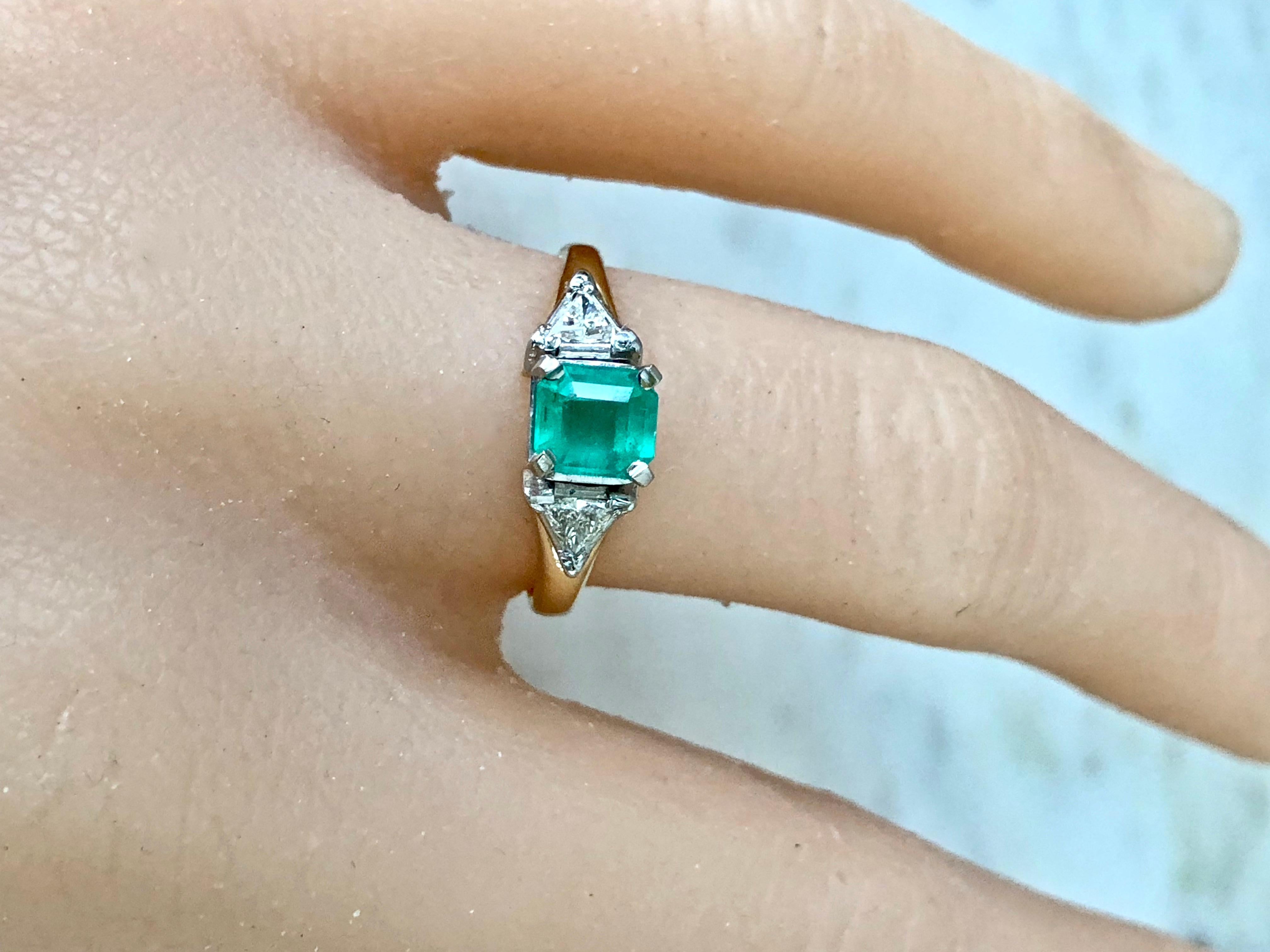 3 stone emerald and diamond engagement ring