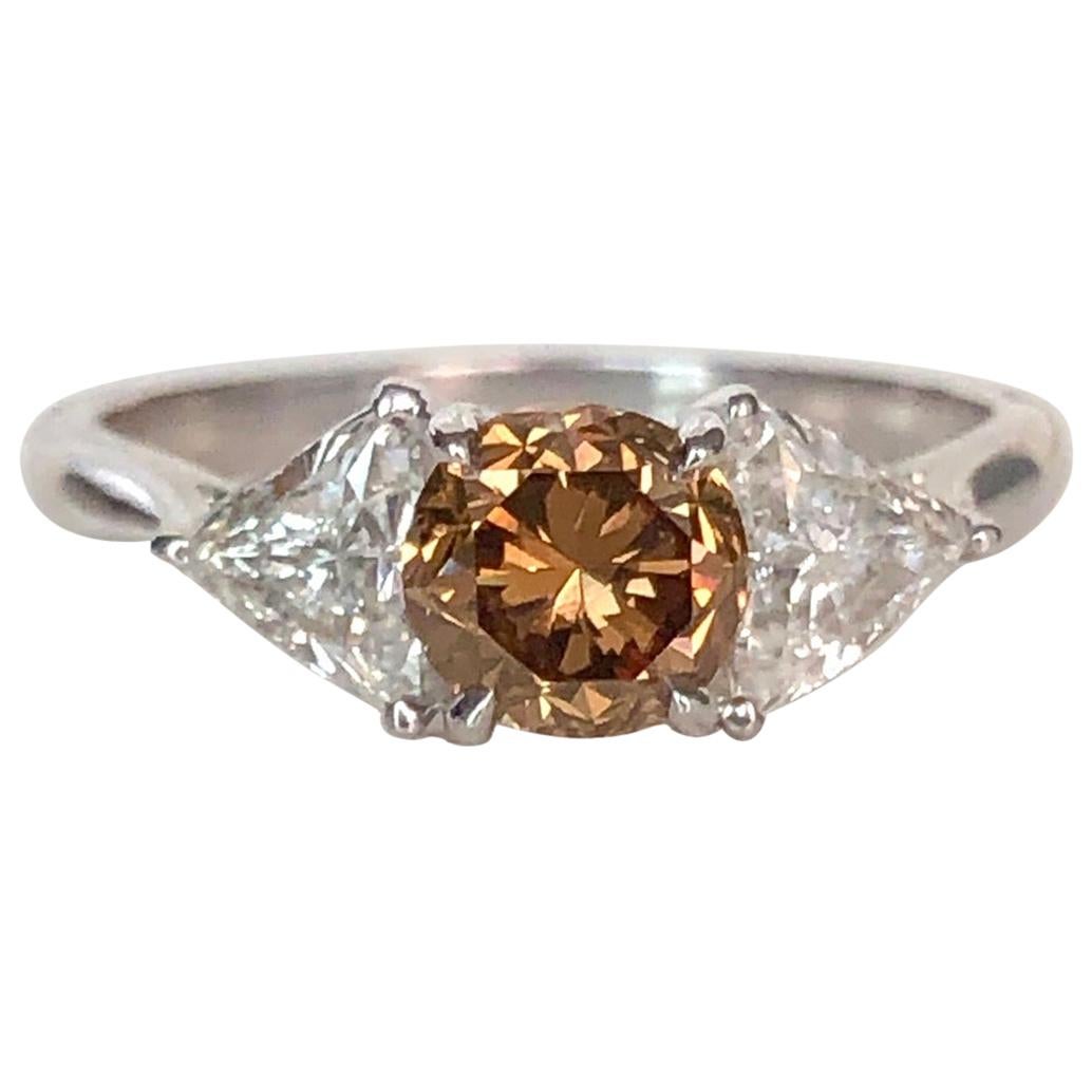 Natural Color Champagne Diamond  0.97 CT, 3-Stone Platinum Ring For Sale