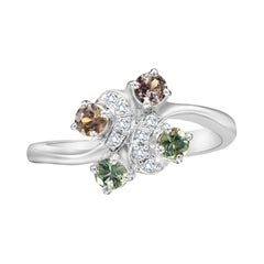 Anello con zaffiro Montana e diamante naturale con cambio di colore, oro bianco 18 carati