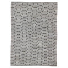Kilim a trama piatta intrecciata a mano in toni naturali