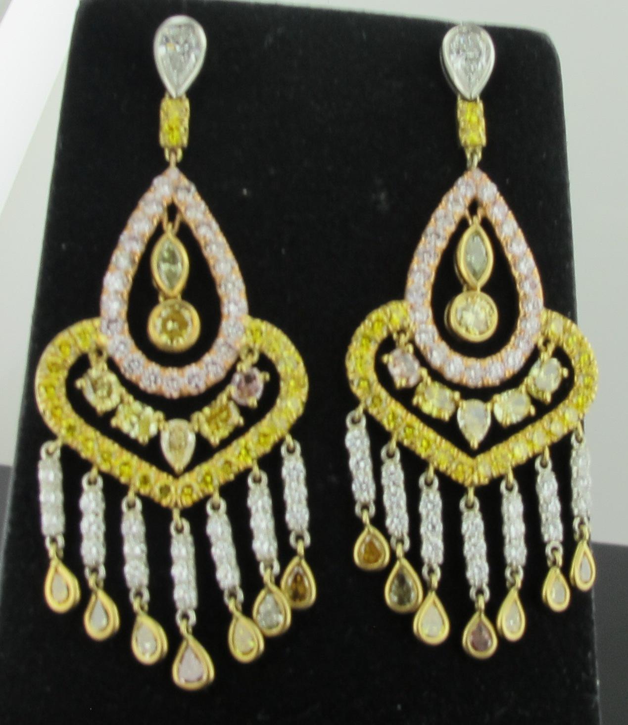 166 Natural colored diamonds in round brilliant, oval, marquise and pear shapes.  Natural Pink, yellow and white stones in a dangle drop style. Total weight is 8.82 carats.  18kt white, yellow and rose gold. 