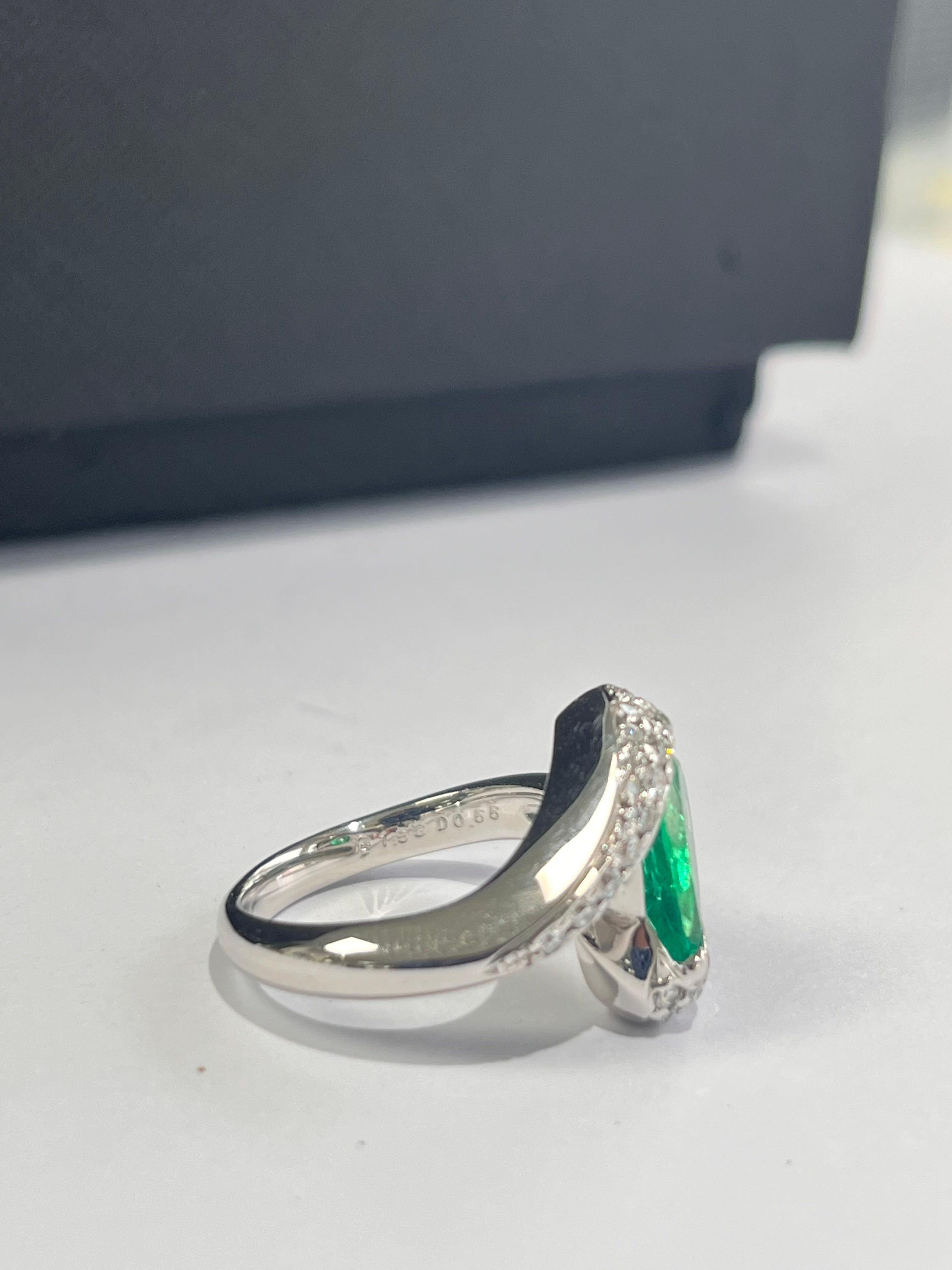 A very beautiful and one of a kind, Columbian Emerald Engagement/ Cocktail Ring set in Platinum 900. The weight of the pear shaped Emerald is 1.53 carats. The Emerald is completely natural, without any treatment & is of Columbian origin. The weight