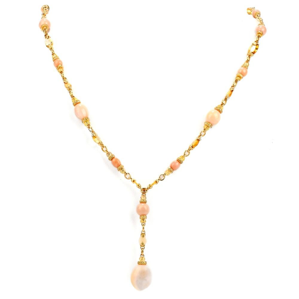 Experience life like Royalty with this absolutely stunning and rare GIA certified, Natural Conch Pearl with Fancy Yellow Diamond & Yellow Sapphire18K Gold Drop necklace!   

Conch Pearls were extremely popular during the Victorian and Edwardian era
