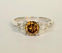 Natural Color Champagne Diamond  0.97 CT, 3-Stone Platinum Ring