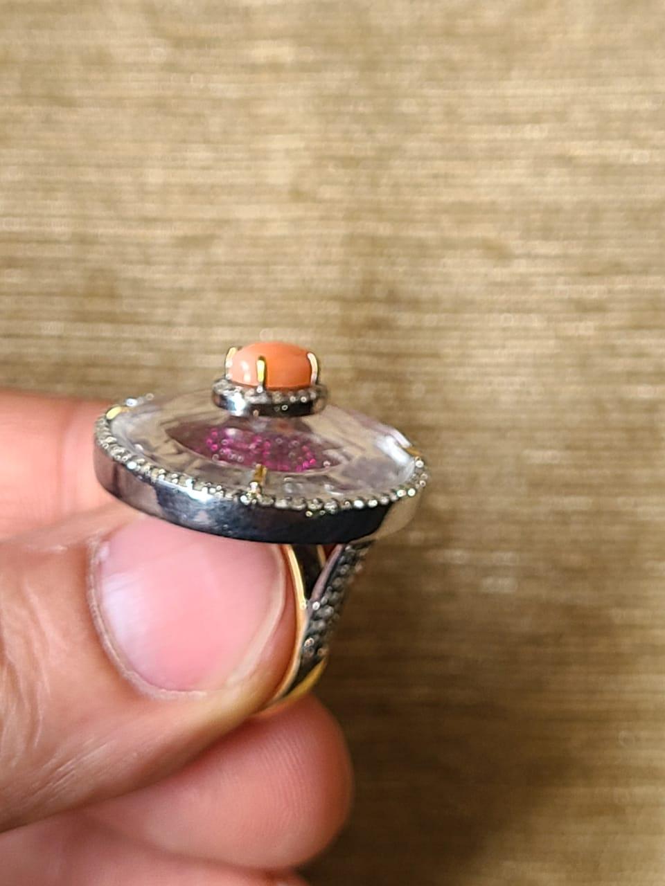 A very gorgeous and beautiful Coral, Crystal & Ruby Victorian style Art Deco Cocktail Ring set in 14k Gold & 925 Silver. The weight of the Coral is 0.80 carats. The weight of the Crystal is 11.53 carats. The weight of the Rubies is 2.67 carats. The