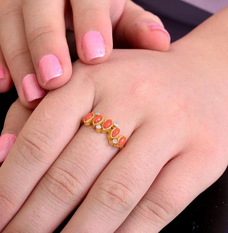 Beautiful Oval Shaped Coral Gemstones ring In 18k yellow gold and diamonds looks stunning This coral ring is so simple yet stylish.

Specifications: 

Dimensions: Ring Size-6.50 US, Top-5*15 MM
Gross Weight: 1.840 gms
Gold Weight: 1.732 gms
Gold