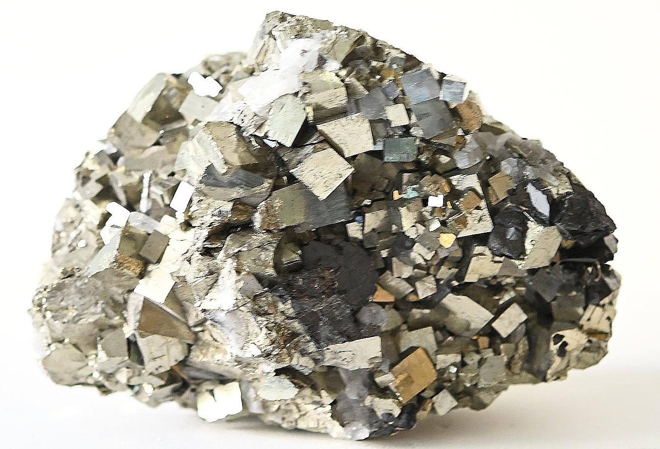 Natural Cubic Pyrite and Quartz Cluster Weighing 7.5 lbs.

Offered for sale is a natural Cubic Pyrite and quartz cluster sourced from the mineral-rich mountains of Peru, this one-of-a-kind formation is entirely natural—unpolished and raw, just as it