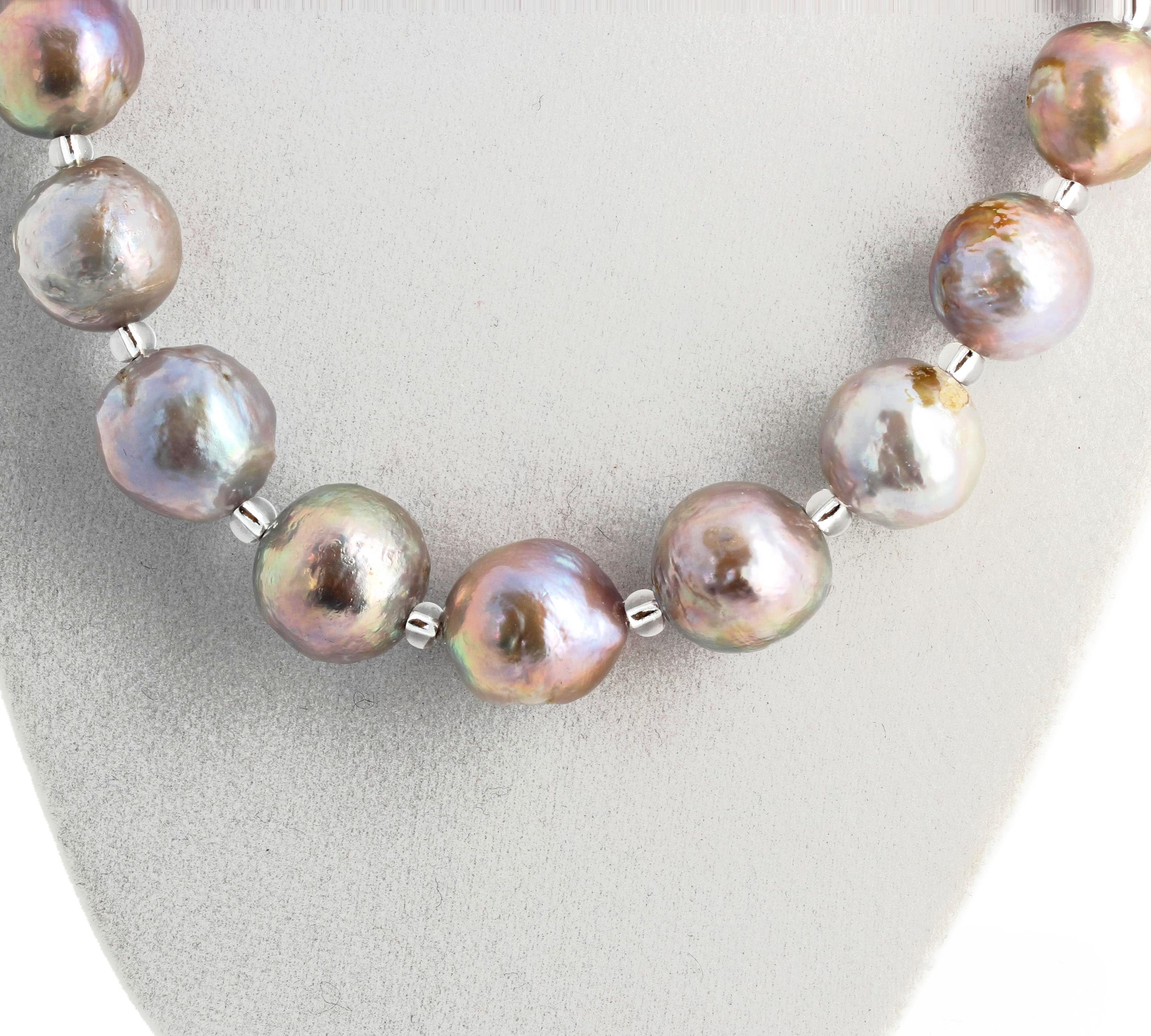 Glowing goldy and silvery and lilac natural cultured Pearls set with brilliant silver sparkling crystals - they make the Pearls even more shiny - in a 17 inch long necklace with a silver clasp.  The little 