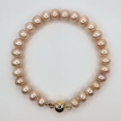 Natural Cultured Pink Pearl Bracelet with 14K Yellow Gold Clasp