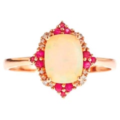 Vintage Natural Cushion Cab Ethiopian Opal and Round-Cut Diamond 10k Yellow Gold Ring