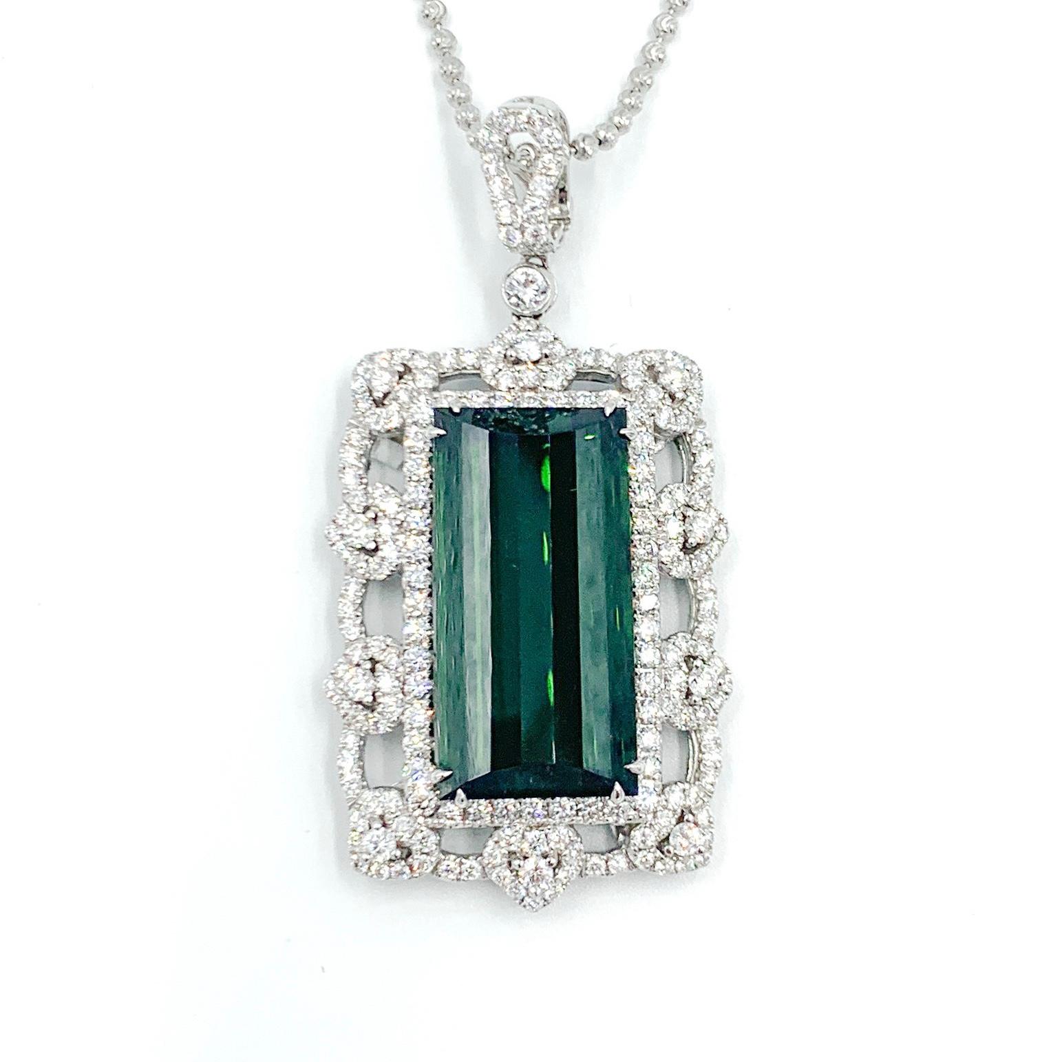 When it comes to dark green tourmaline, sometimes referred to as verdelite, this pendant exemplifies perfection. This natural stone features a pure green hue, very dark tone, and excellent saturation. The 4.25 carats of F/G color, SI clarity