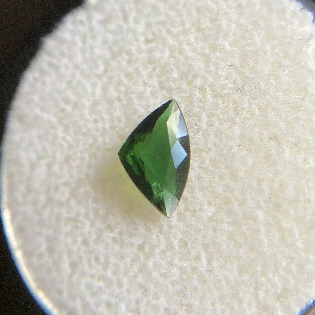 Natural Deep Green Chrome Tourmaline 0.49ct Trillion Triangle Cut Rare Gem

Natural Chrome Tourmaline with a beautiful deep green colour. 
The colour on this stone is stunning, a deep green colour. It also has a very good trillion/triangle cut.