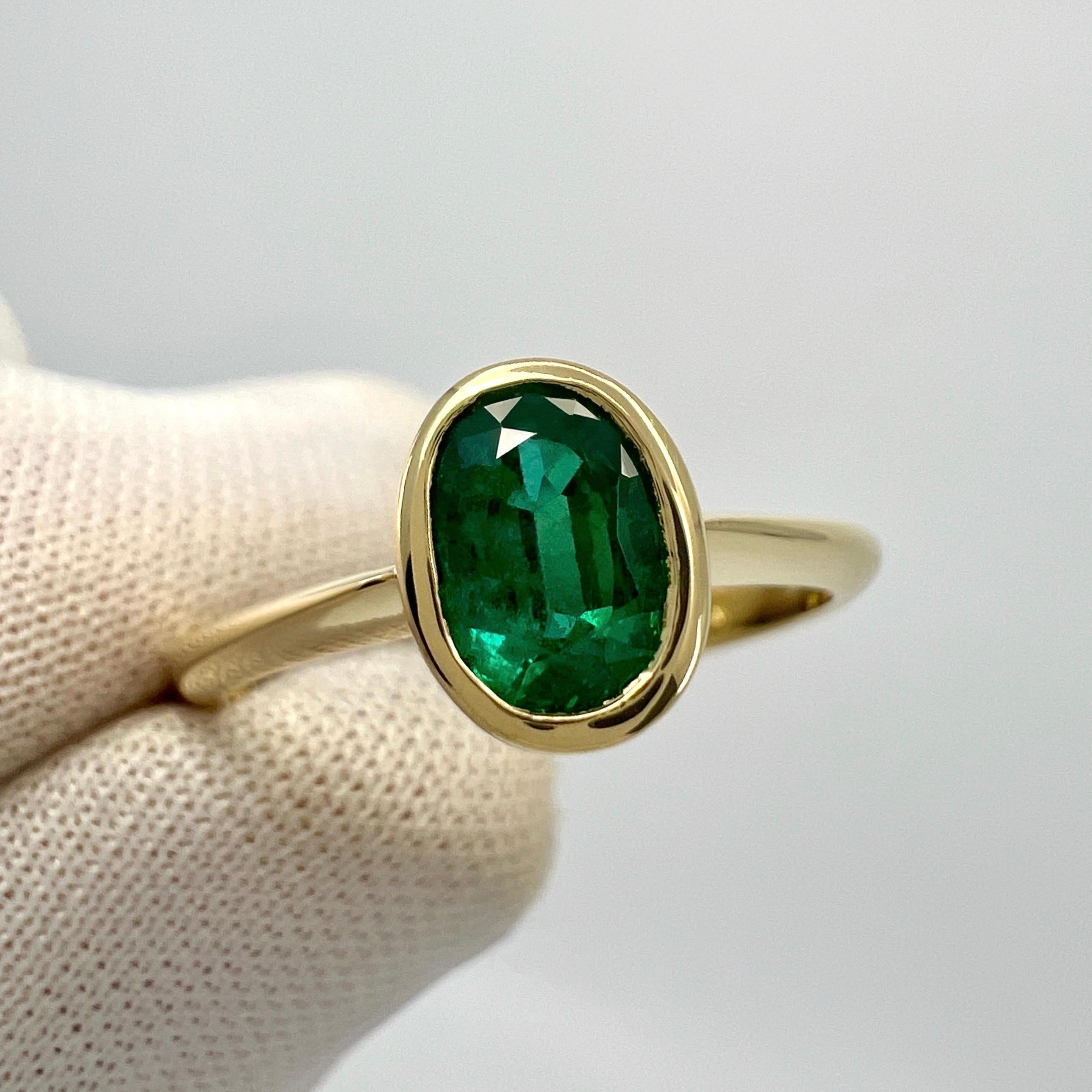 Women's or Men's Natural Deep Green Emerald Oval Cut 18k Yellow Gold Rubover Bezel Solitaire Ring For Sale
