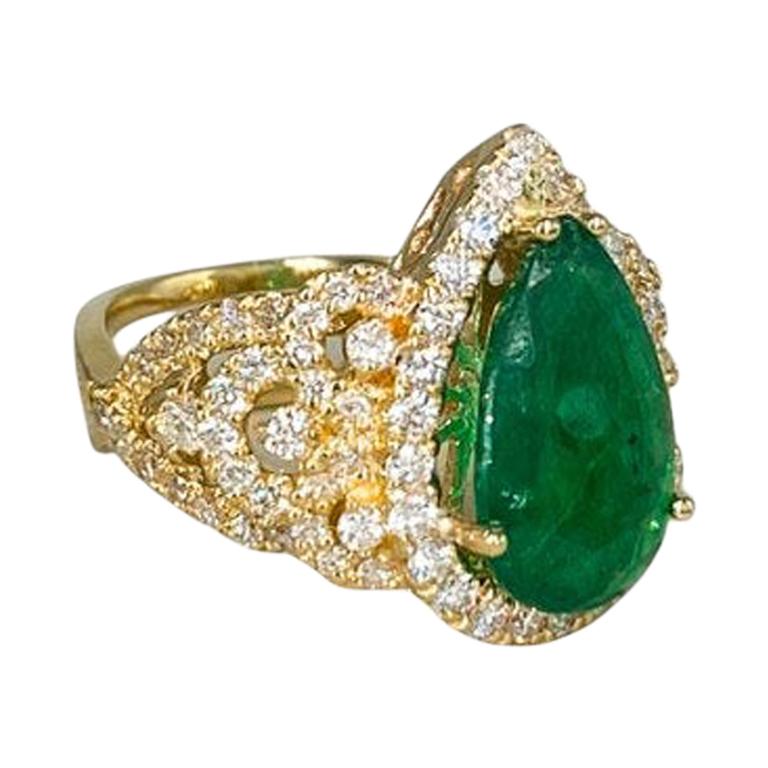 Natural Deep Pear Cut Emerald 18 Karat Yellow Gold Diamond Ring for Her For Sale