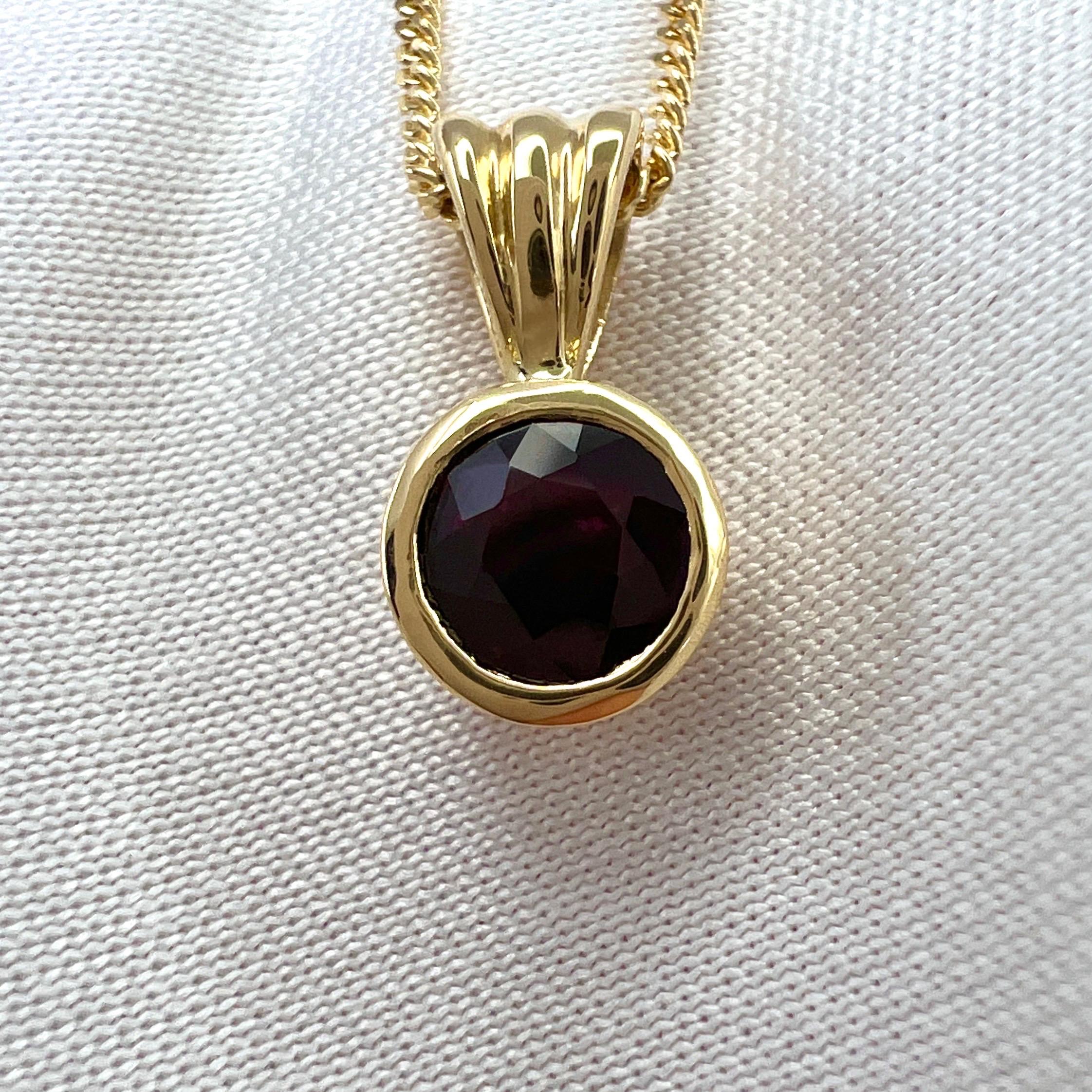 Natural Deep Red Ruby 18k Yellow Gold Solitaire Pendant Necklace.

Stunning 0.51 carat ruby with a beautiful deep red colour and excellent round cut. Also has good clarity with only some small natural inclusions visible when looking closely. 

The
