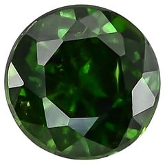 Granate Demantoide Natural con inclusiones de "cola de caballo" Piedra 0,77 cts / Informe GIA