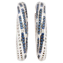 Diamante naturale 0,18cts e zaffiro blu 1,48 in oro 18k