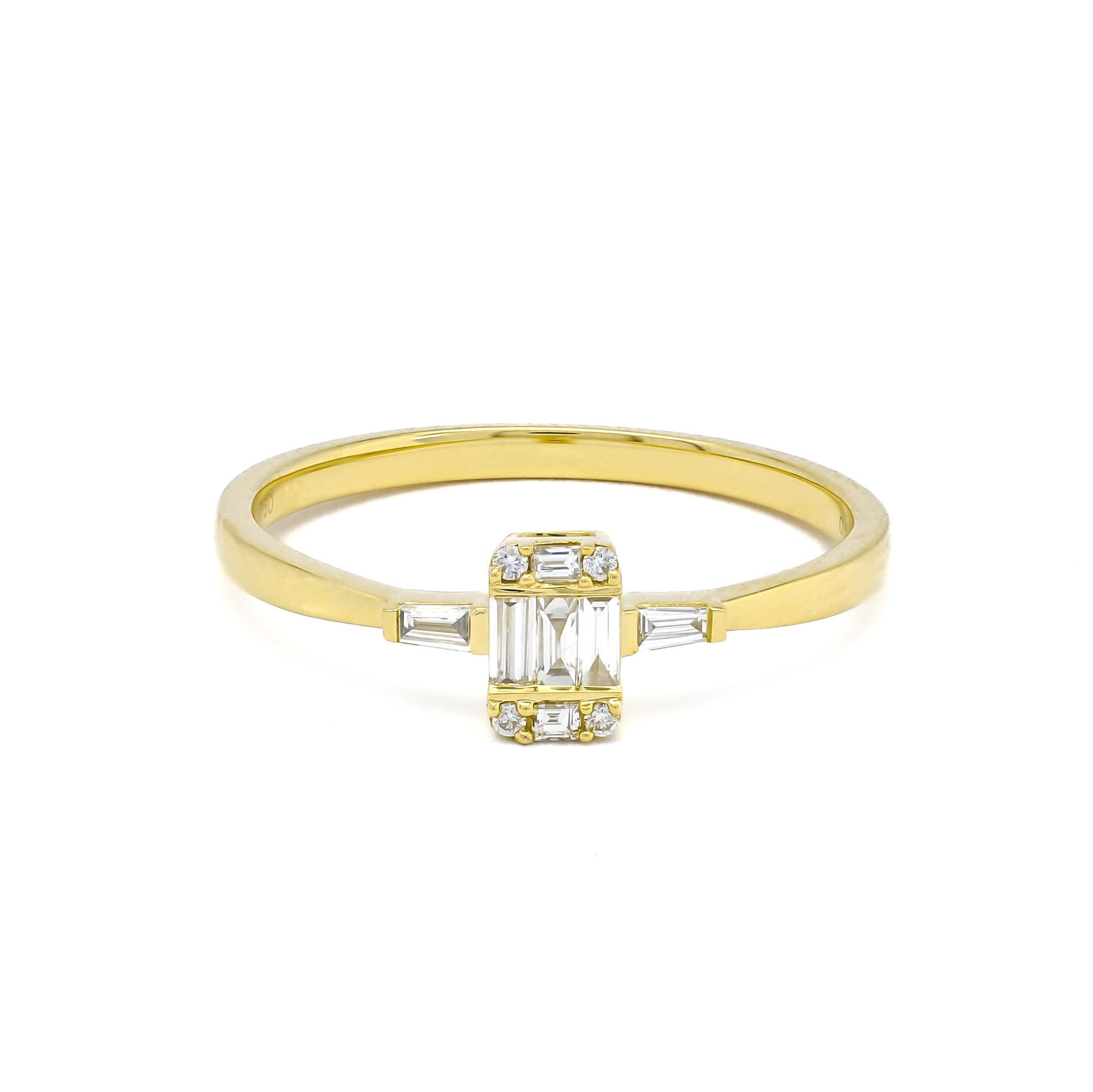 
 Crafted with meticulous precision, this ring is a true testament to the artistry of fine jewelry. Fashioned from the gleaming beauty of 18-karat yellow gold, it features an enchanting illusion setting adorned with natural baguette x Brilliant-cut