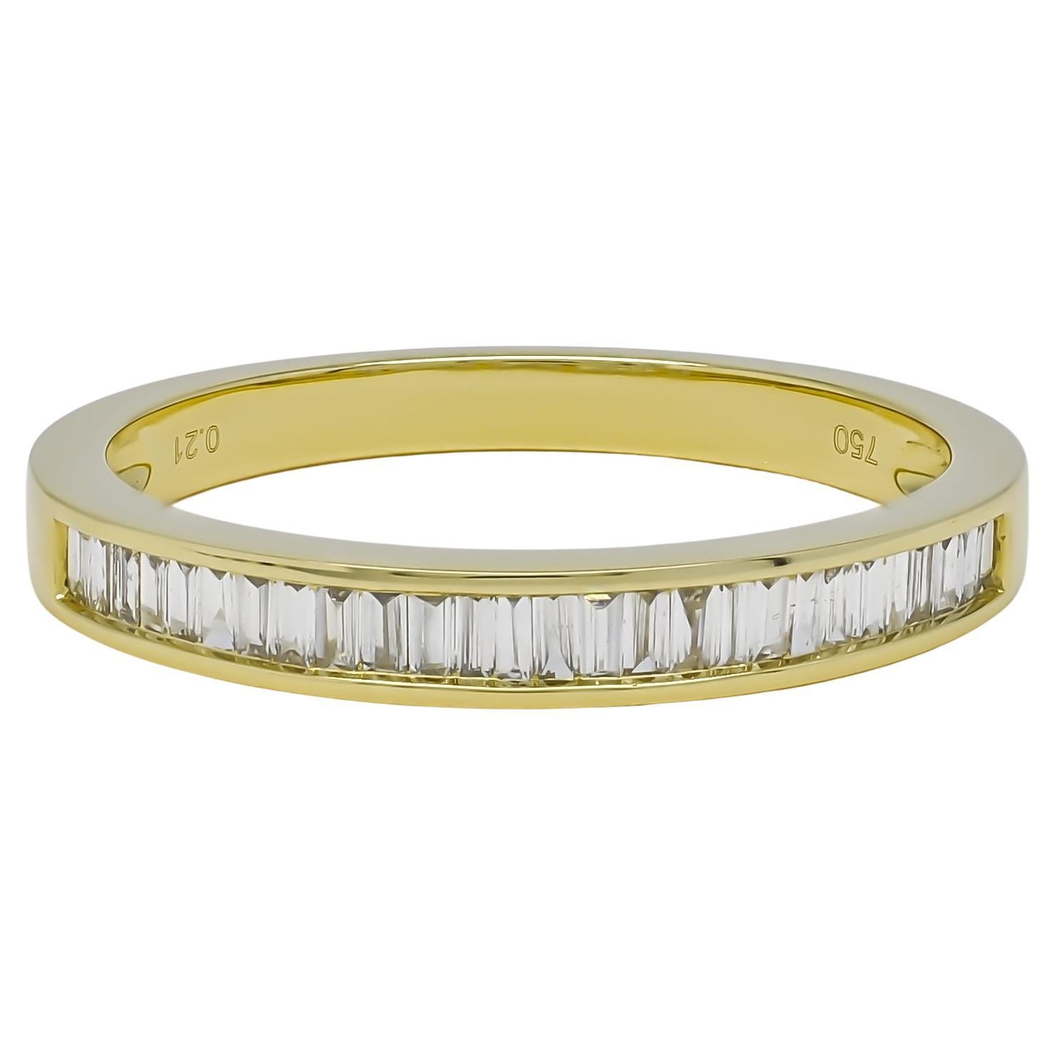 This exquisite 18KT Rose gold half eternity band embodies timeless elegance and sophistication. Adorned with 0.26 carats of meticulously set round and baguette diamonds, the band captures and reflects light from every angle, creating a mesmerizing
