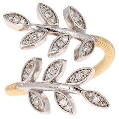 Anillo de oro amarillo con diamante natural de 0,28 quilates en forma de hoja
