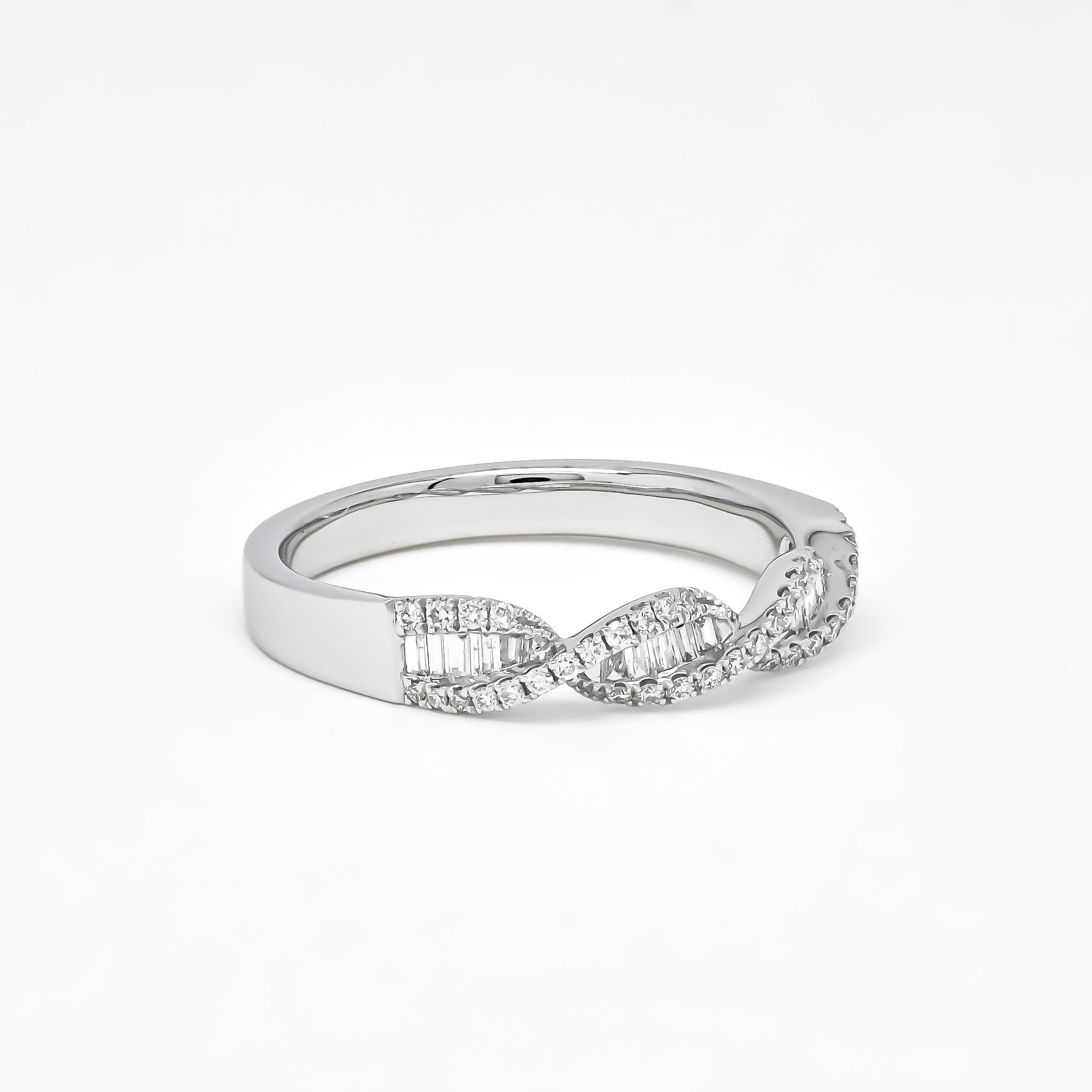 Make an impact with our dynamic DNA Felix Fashion Band ring, a stunning piece encrusted with sparkling natural baguette and round diamonds. This exquisite half-band ring is meticulously crafted in luxurious 18KT gold, showcasing a total diamond