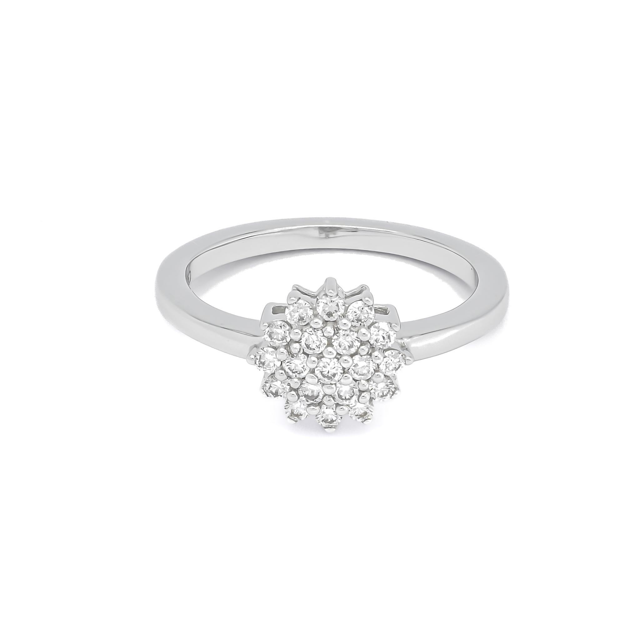 Crafted from exquisite 18-Karat white gold, the Cluster Star Ring is a radiant masterpiece that seamlessly blends sophistication with celestial charm. 

The ring features a star-shaped cluster design adorned with a total of 0.30 Carats of natural
