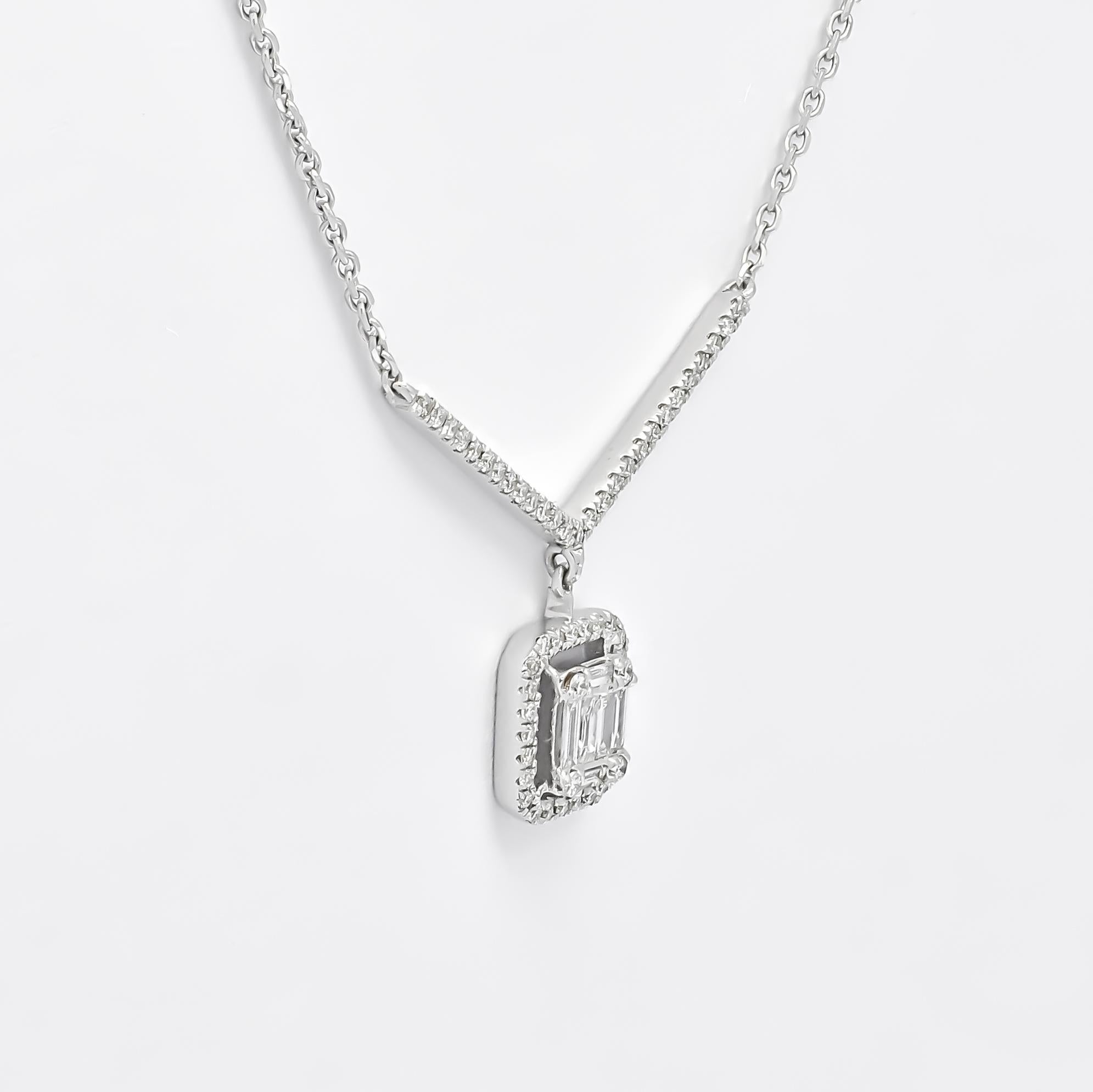 This 18KT White Gold Natural Diamonds Cluster Art Deco Pendant in a single row diamond chain  epitomizes sophistication and charm. Adorned with a total of 0.31 carats of sparkling diamonds, it stands as a radiant symbol of elegance.

Crafted with