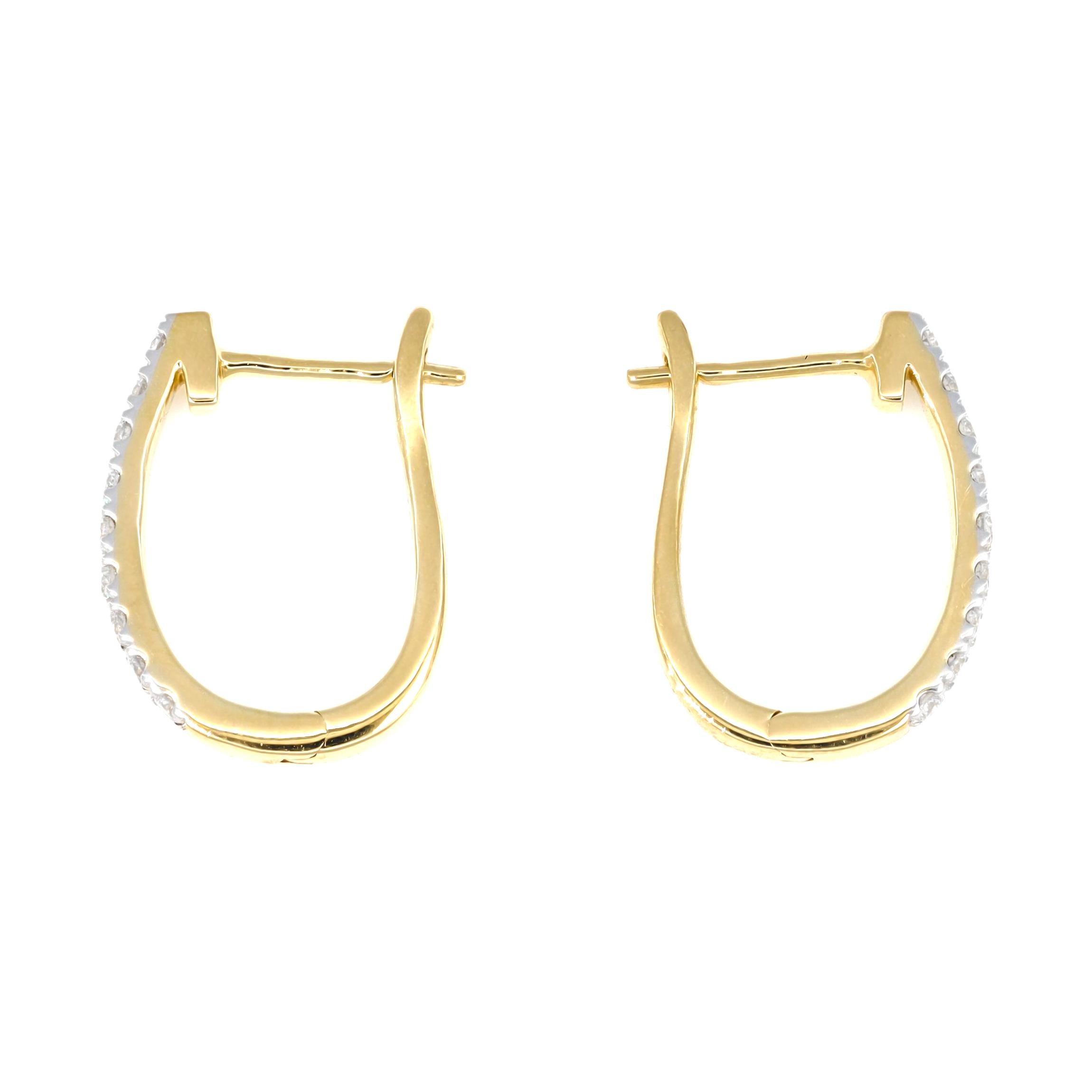 Introducing the epitome of minimalistic beauty, our 18KT Gold Round Diamond Half Hoop Huggies redefine elegance with understated charm.

At the heart of these huggies lie brilliant round diamonds, totaling 0.35 carats, exuding a captivating sparkle