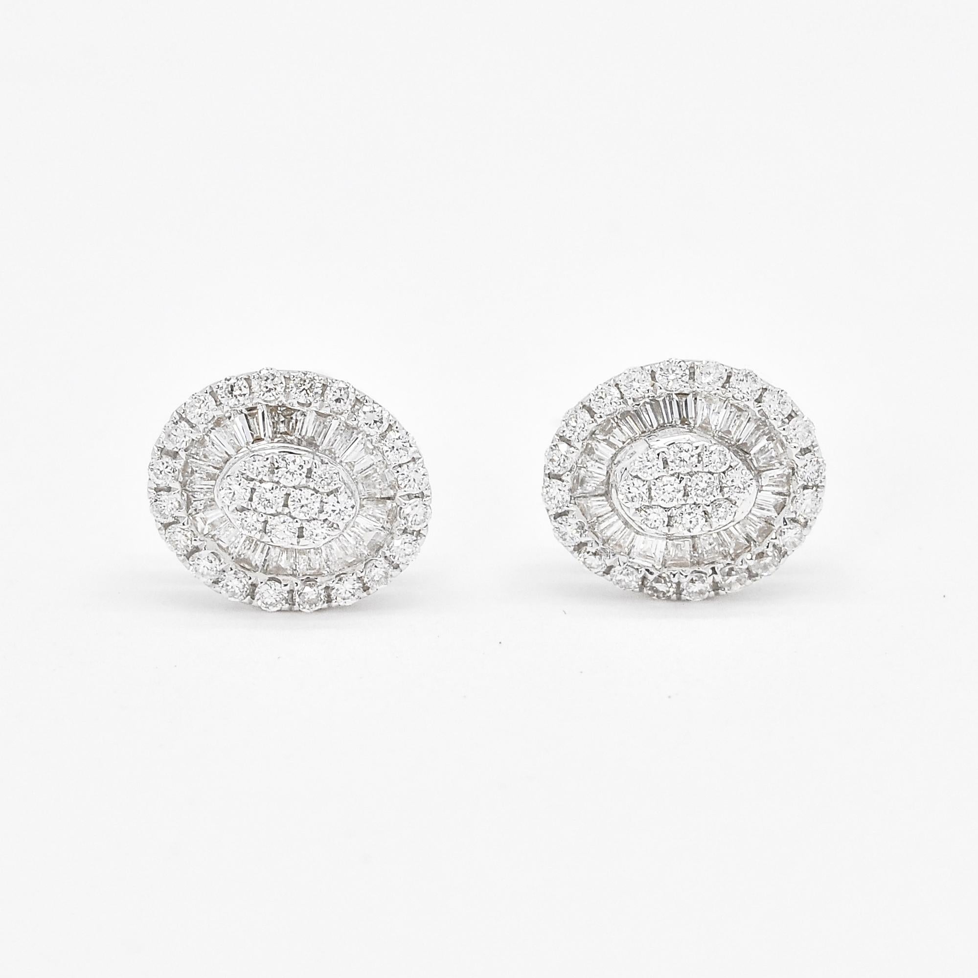 Introducing our breathtaking Natural Diamond Earrings in 18KT White Gold, boasting an exquisite Illusion Halo Cluster design. These earrings are a true embodiment of modern elegance, meticulously crafted to elevate the style and beauty of