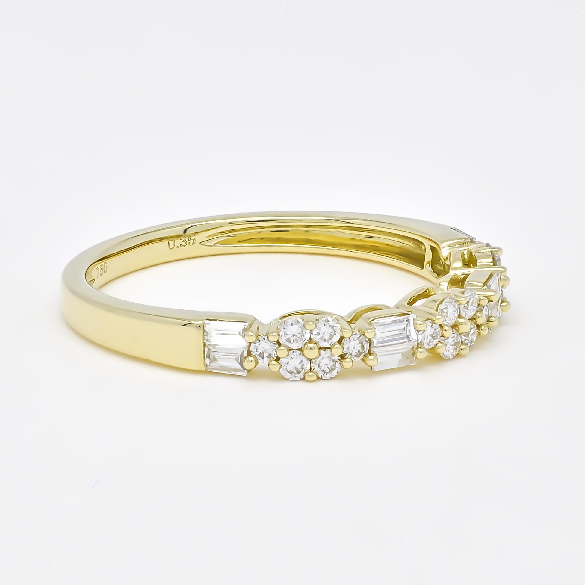 A modern masterpiece, this striking band is a true testament to contemporary elegance and design. Featuring a petite cluster of round diamonds seamlessly paired with brilliant baguettes, the unique alternating design of this band creates a