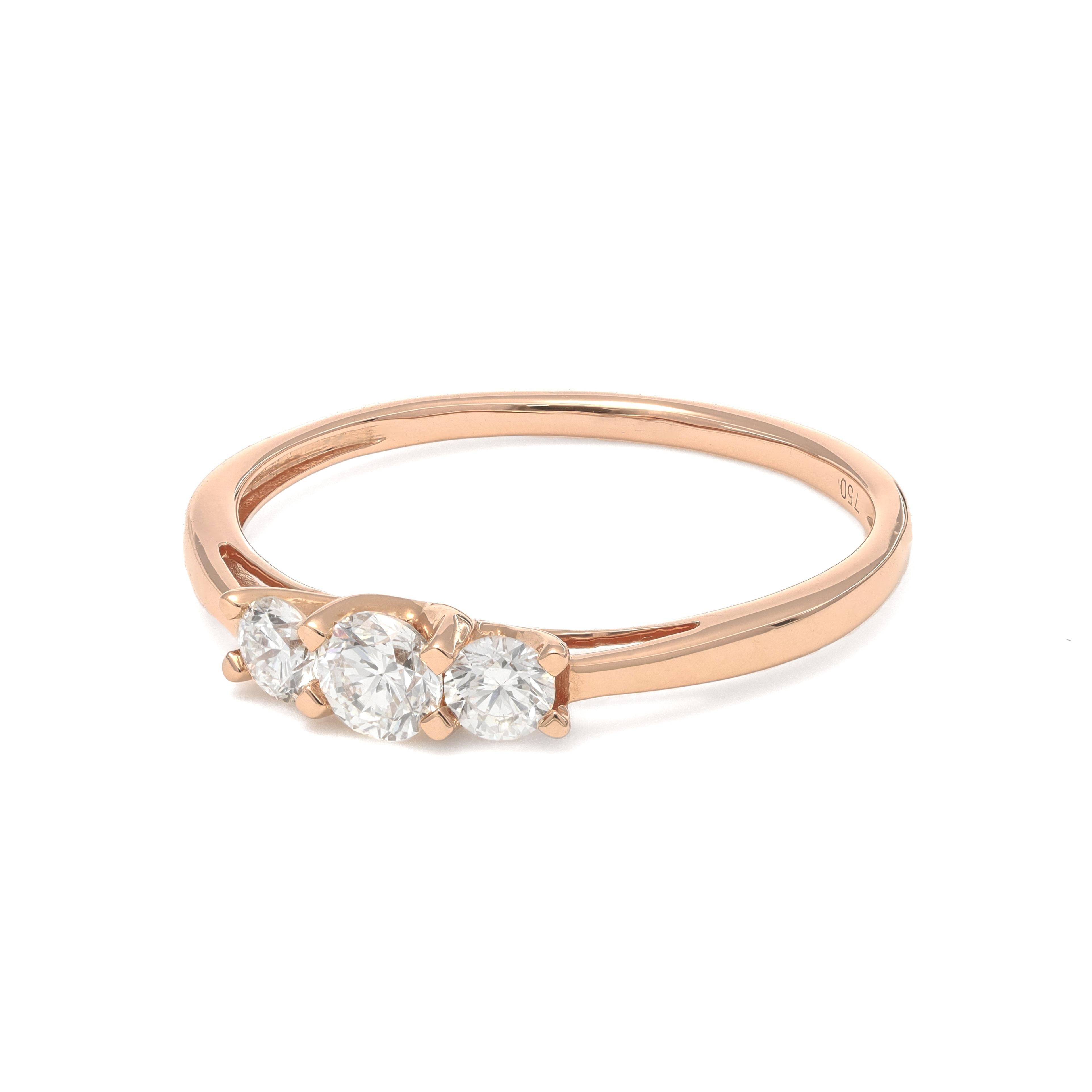 Presenting a masterpiece of elegance and sophistication: our 3 Round Cut Diamond Engagement Ring, designed to capture hearts and admiration. Crafted in radiant 18KT Rose gold, this ring features three dazzling natural diamonds, totaling 0.40 carats,