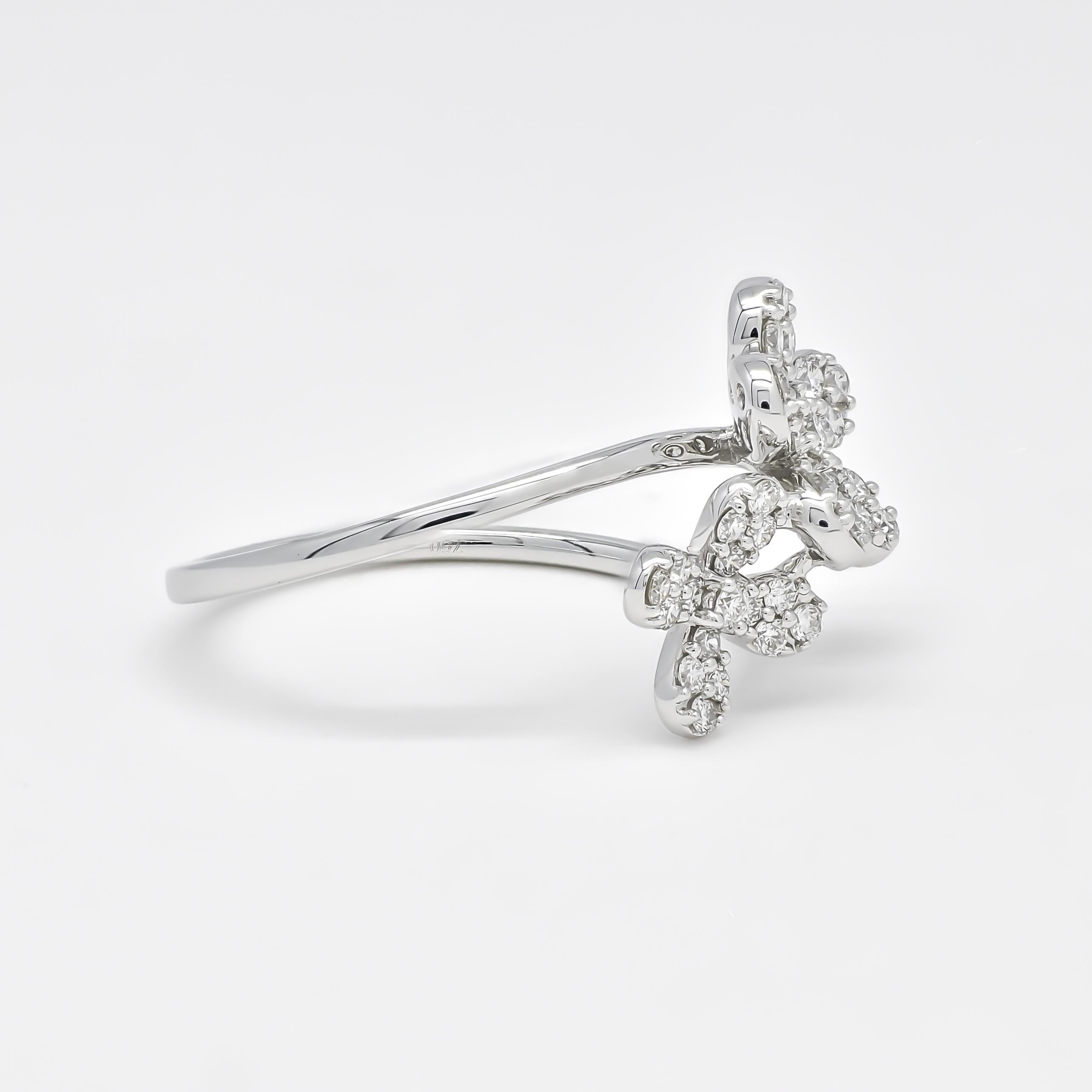 A flower cluster diamond ring is a timeless and elegant piece of jewelry that is perfect for any young girl. This 18KT white gold petite ring is especially designed to fit the delicate fingers of a young girl, making it the perfect choice for her
