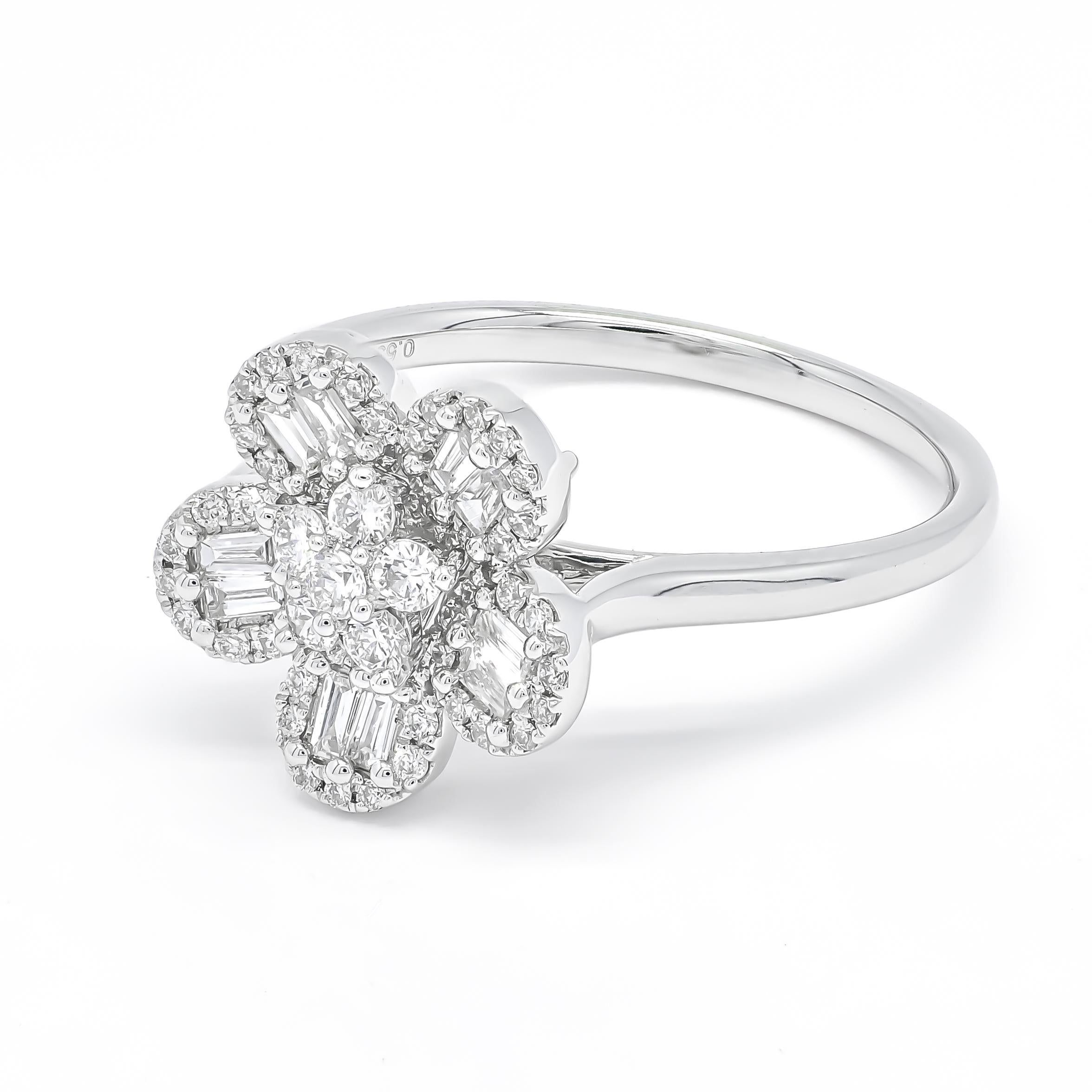 
Indulge in the brilliance of this breathtaking 18KT White Gold ring, where dazzling round-cut and baguette diamonds unite to form a spectacular starburst flower cluster. Boasting a total of 0.53 carats, each diamond is expertly set to maximize its