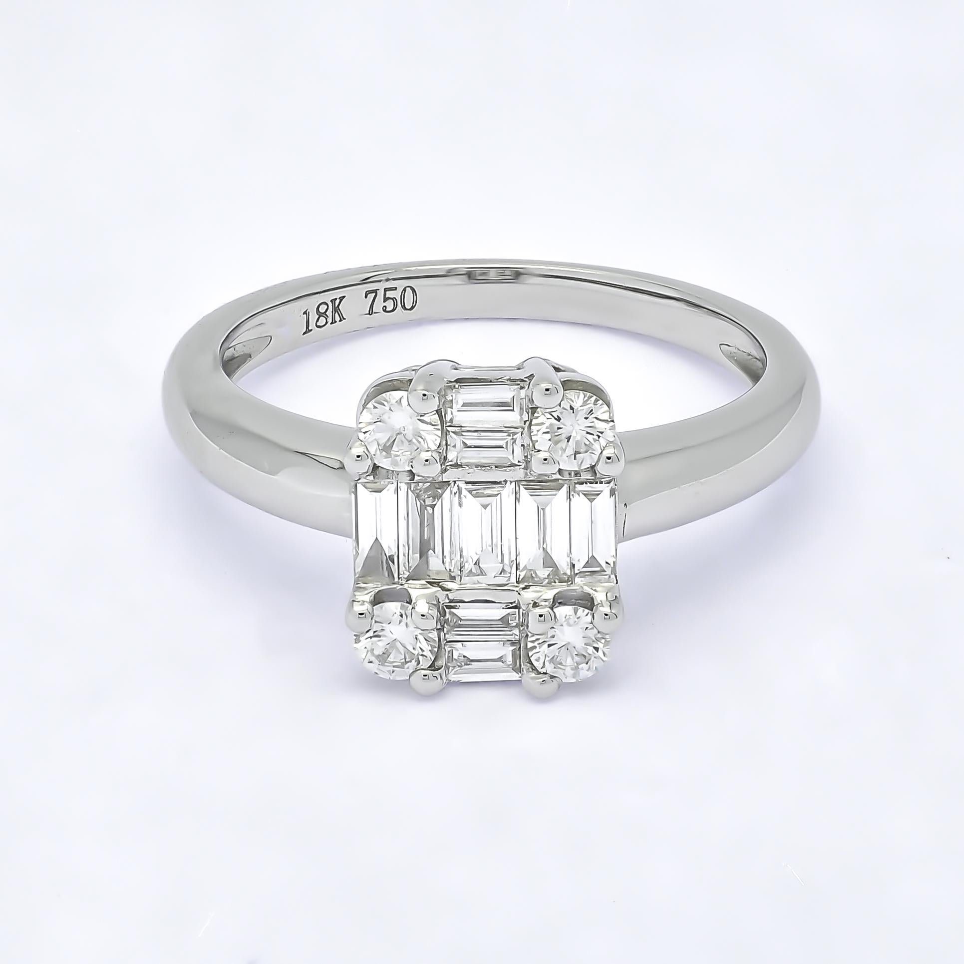 This captivating ring presents a stunning cluster of dazzling round and baguette diamonds, designed to catch the light from every angle. Expertly crafted from 18KT white gold, this ring showcases 0.55 carats of sparkling diamonds, meticulously