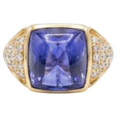 Bague en or 14 carats sertie d'un diamant naturel de 0,62 carat et d'une tanzanite de 10,90 carats
