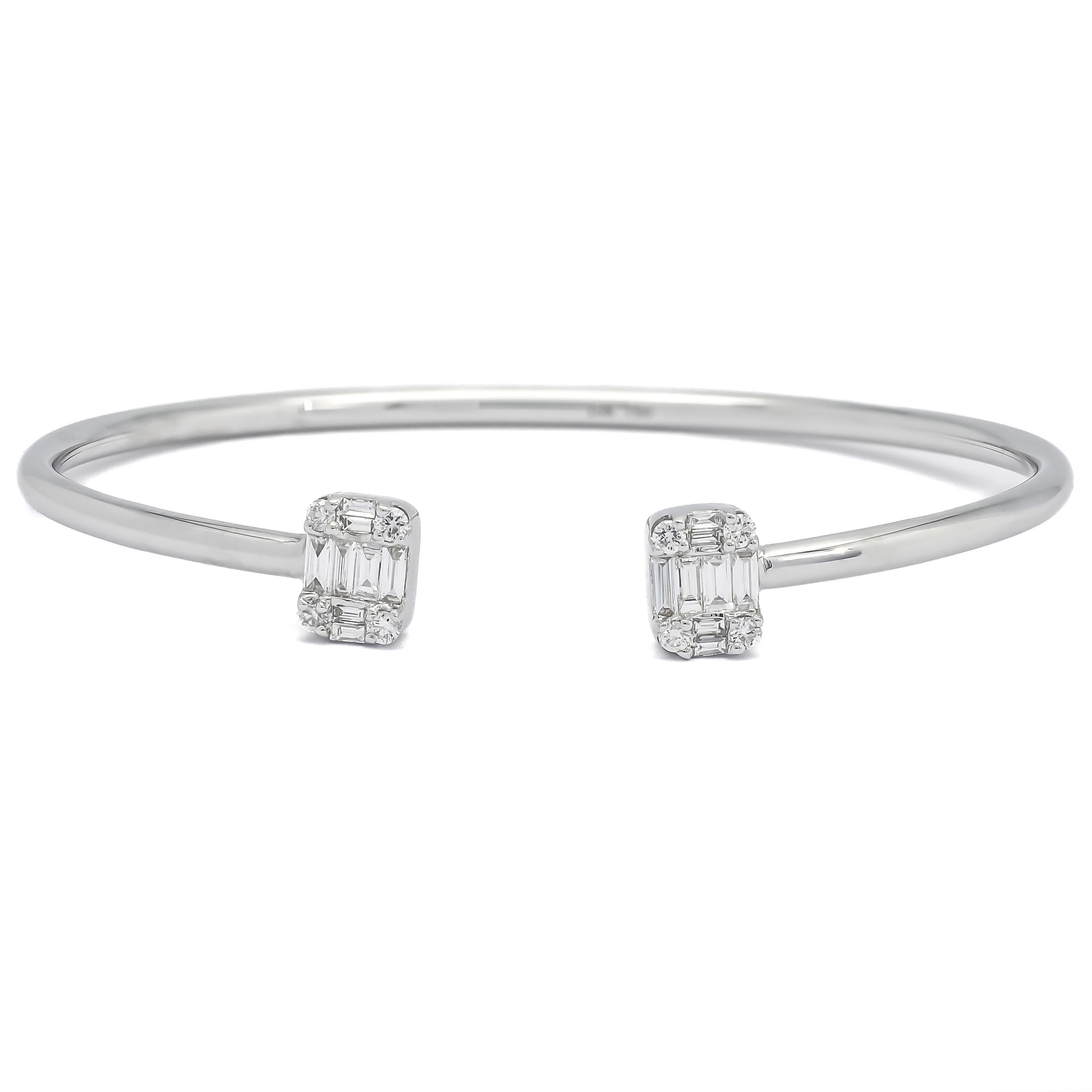Step into a world of unparalleled elegance and luxury with this exquisite bangle bracelet, adorned with a captivating square cluster of tapered baguette and round-shape diamonds. Crafted in 18KT gold, this bracelet is a masterpiece of fine jewelry