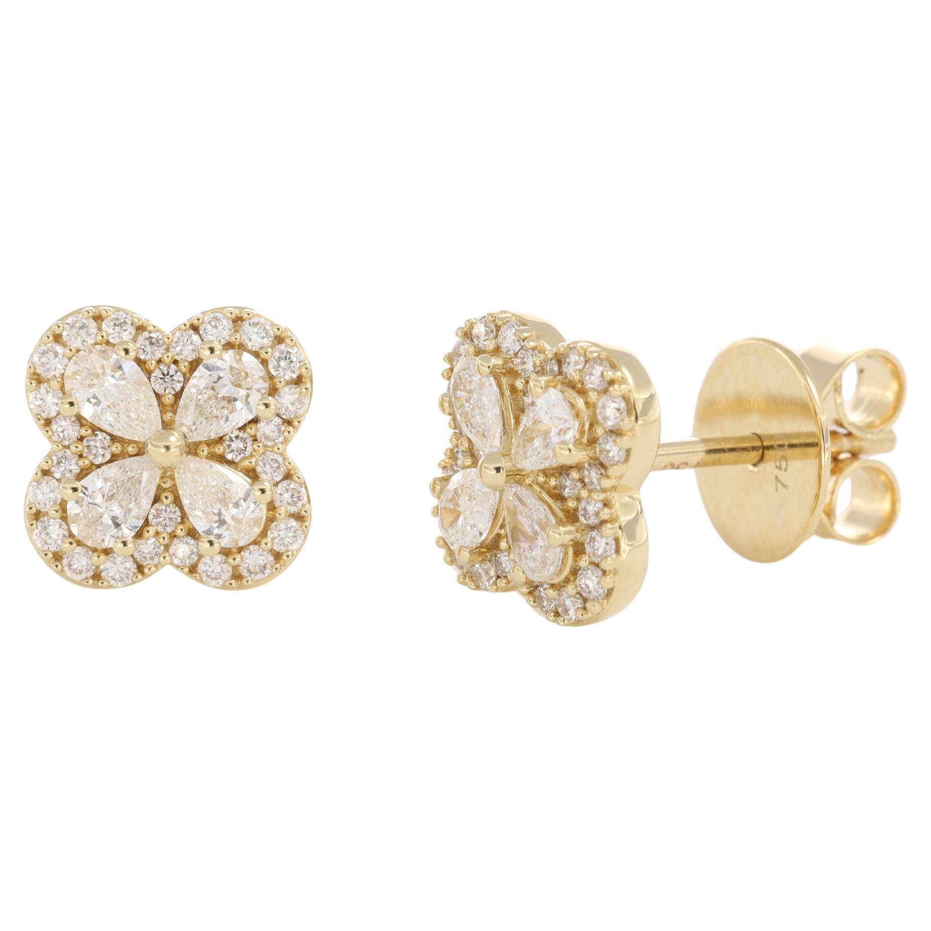 Designed to captivate, these breathtaking studs are meticulously crafted from 18KT Yellow Gold, exuding warmth and luxury. At the heart of their floral design, marquise-shaped natural diamonds form delicate, petal-like structures, elegantly arranged