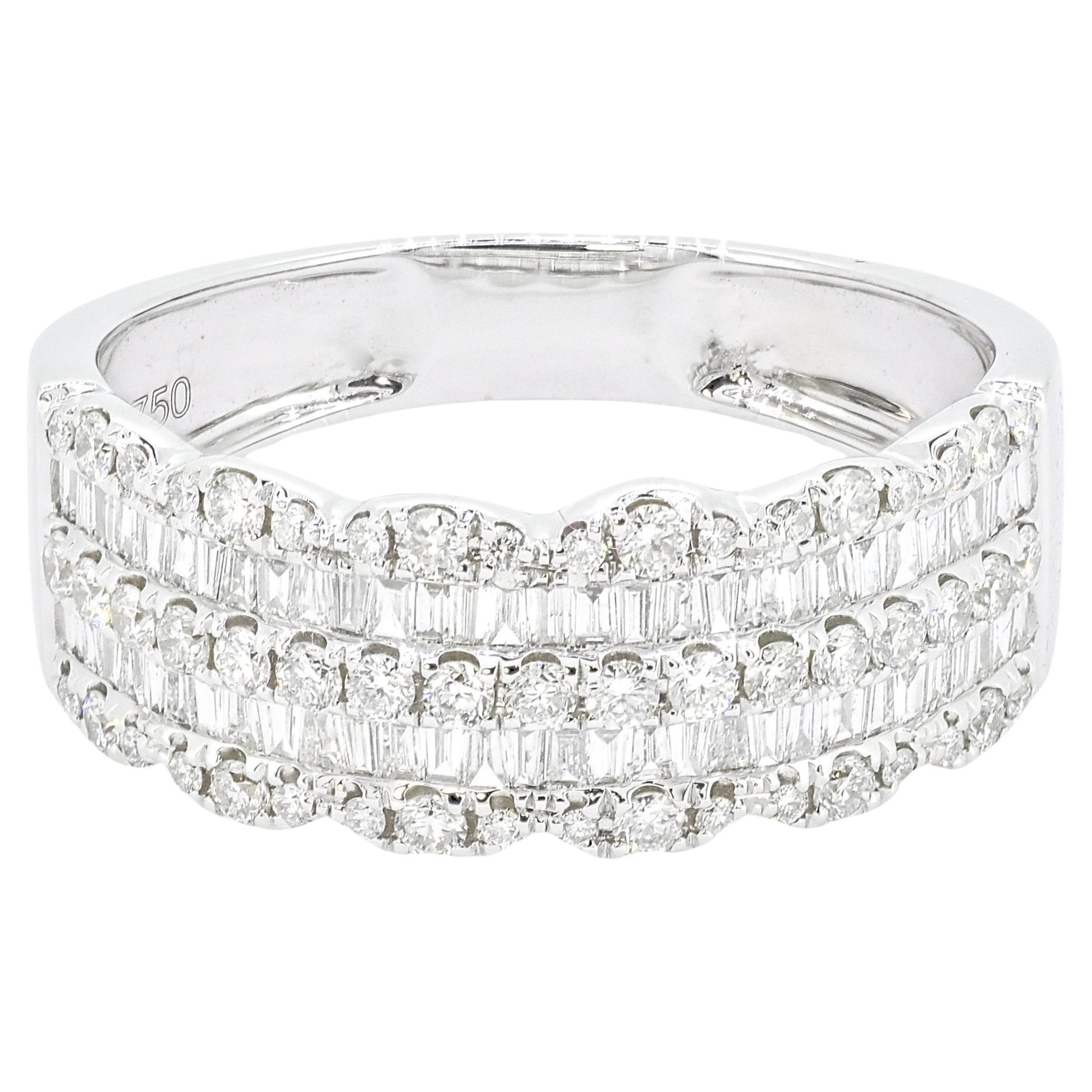 If you're looking for a beautiful and versatile diamond band that can be worn alone or stacked with other rings, consider a baguette and round diamond channel set 18KT Yellow gold band.

 This exquisite piece features a row of alternating baguette