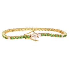 Natural diamond 0.80cts & tsavorite 3.07cts bracelet in 18k gold