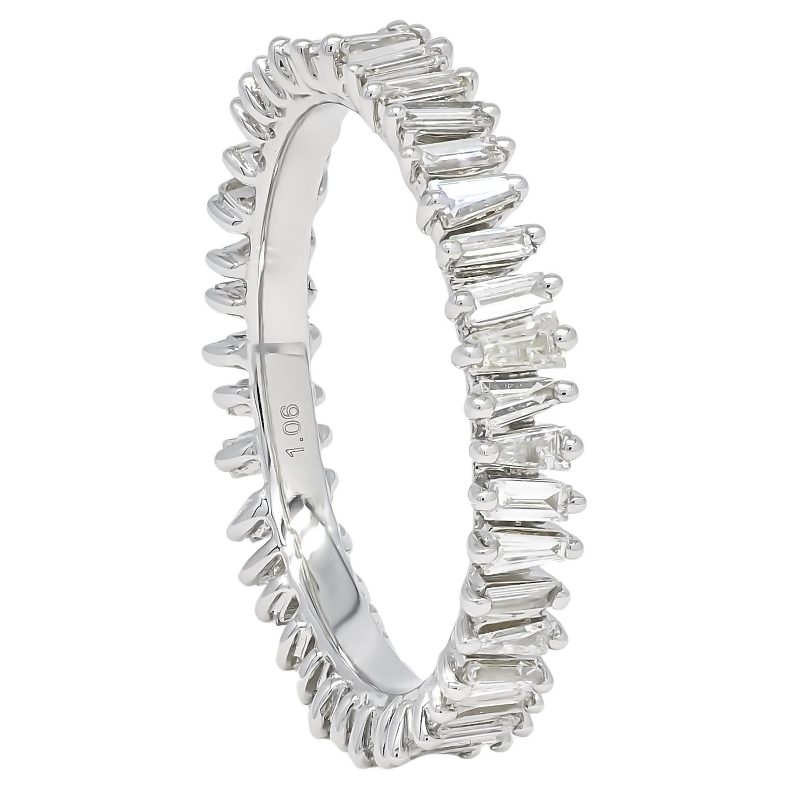 Dramatically different and undeniably captivating, make this exquisite diamond ring your signature piece. Featuring an innovative design, this ring showcases gorgeous zigzag prong-set baguettes meticulously arranged in a luxurious 18 KT gold