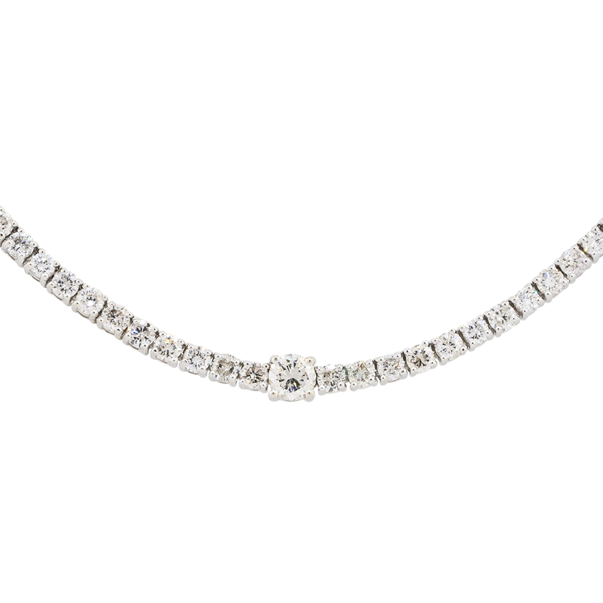 Natural Diamond Tennis Necklace With Large Diamond Stations 14 Karat

You cannot go wrong with this lovely diamond tennis necklace. This tennis necklace is unique with 7.50 carats of natural, round, brilliant cut diamonds and larger diamond